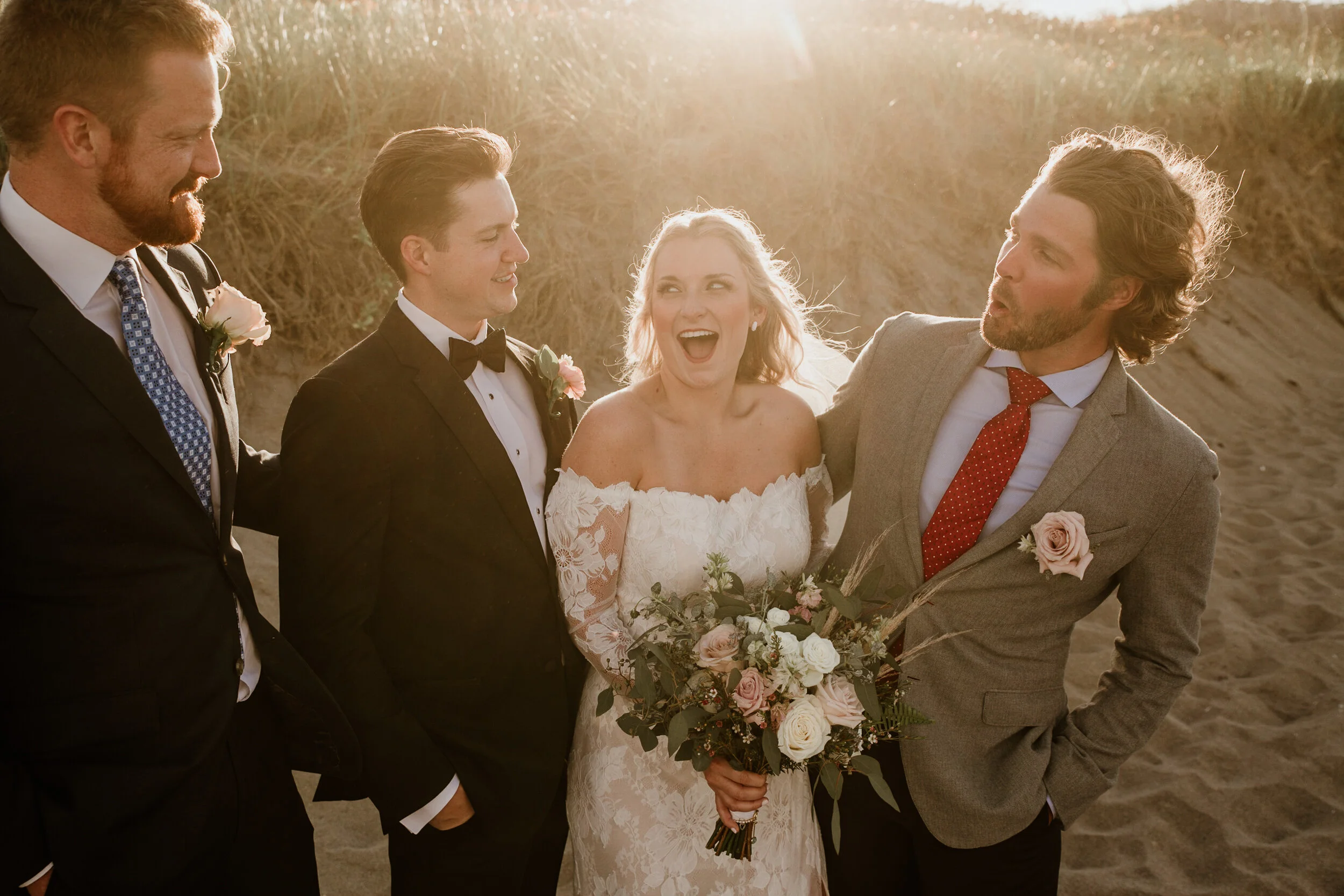 bride, groom and brothers all smile for photo