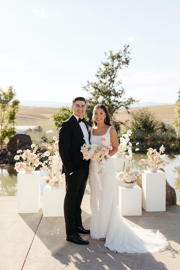 Bride and Groom with Pillar Flowers for an Oregon Wedding Ceremony.jpg