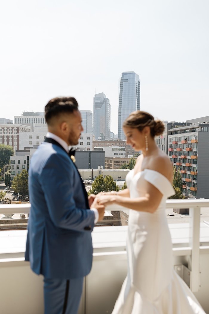 First Look for Bride and Groom on a Rooftop in Portland, Oregon