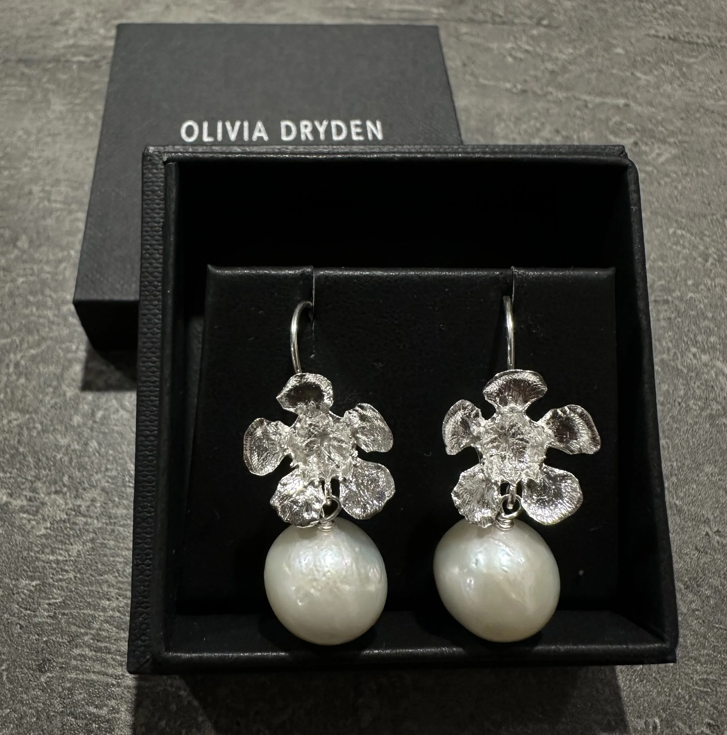 Medium Geraldton Wax with Pearl Earrings made by Olivia Dryden. She is a jeweller and taxidermy artist from Adelaide, South Australia.