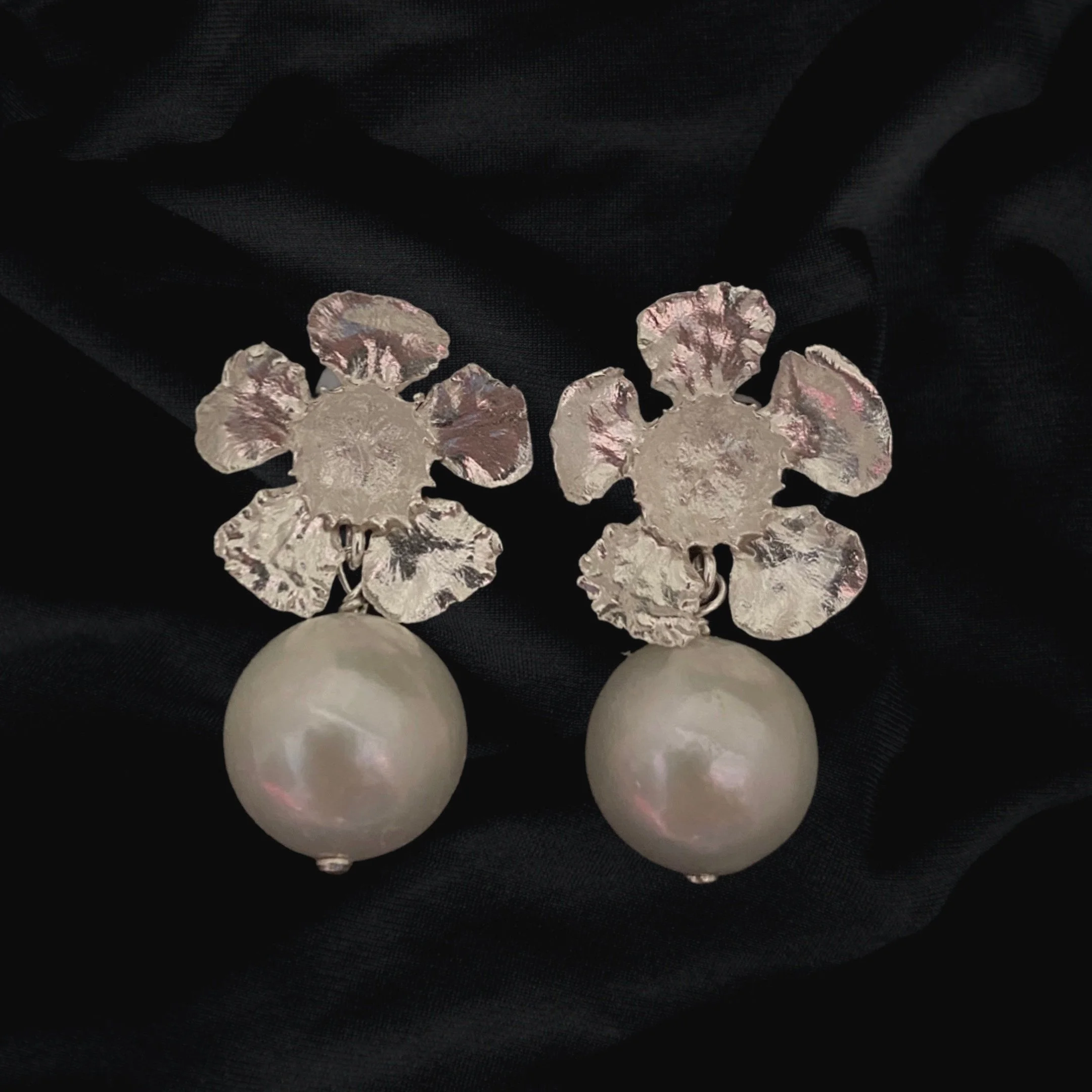 Medium Geraldton Wax with Pearl Earrings made by Olivia Dryden. She is a jeweller and taxidermy artist from Adelaide, South Australia.