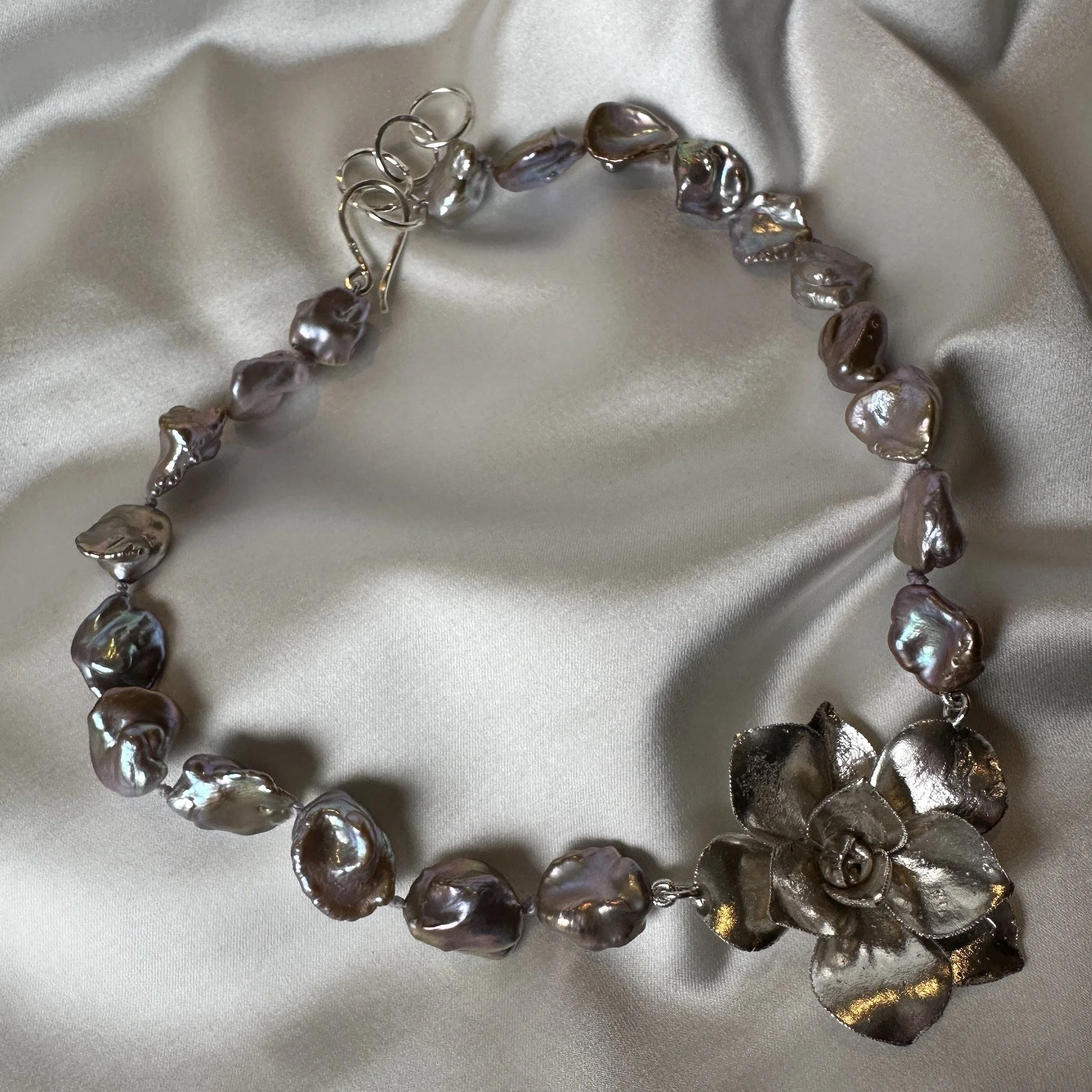 How to Style Pearls Without Looking Traditional