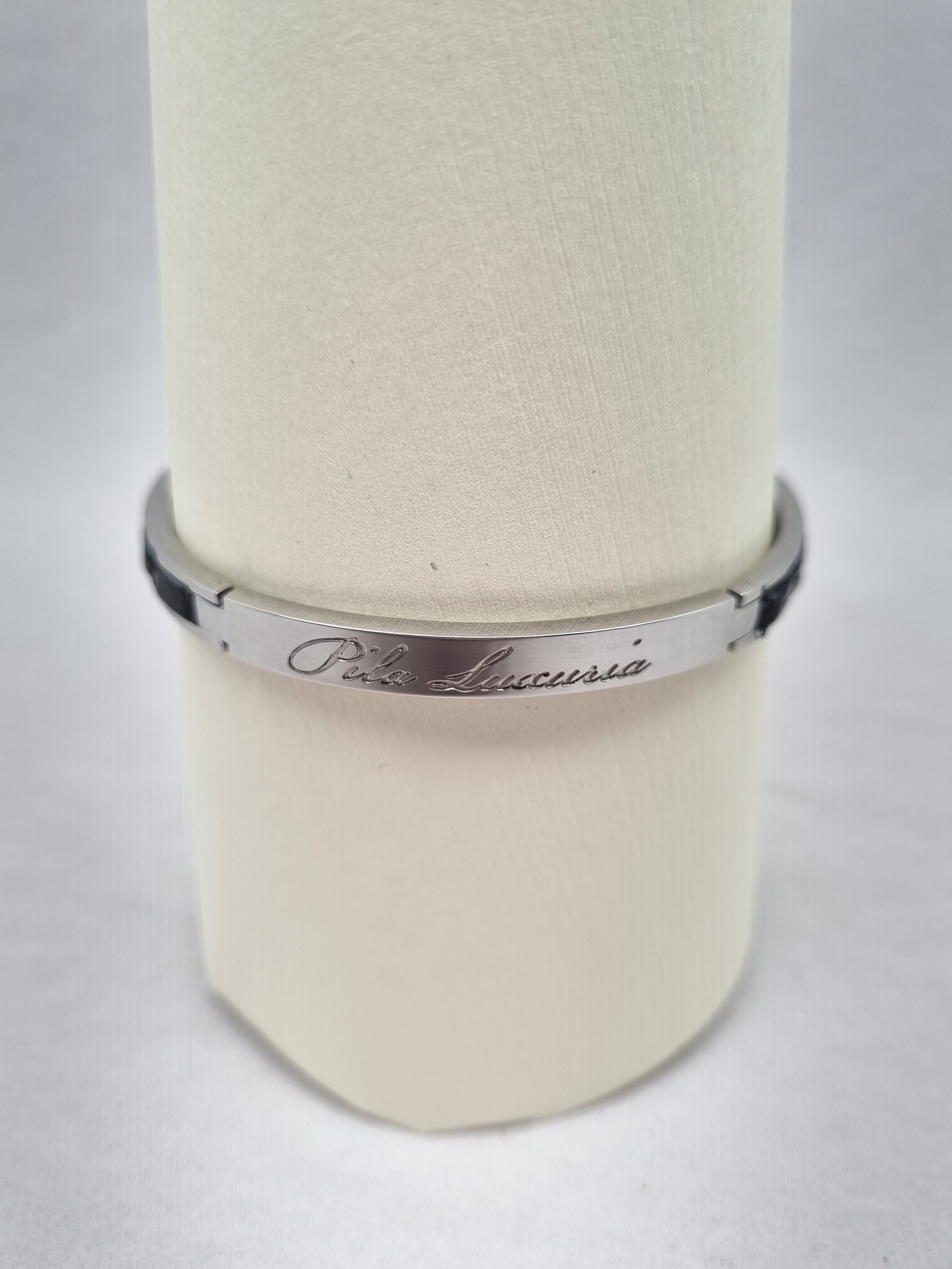 Authentic black crocodile leather bracelet with Pila Luxuria inscription.