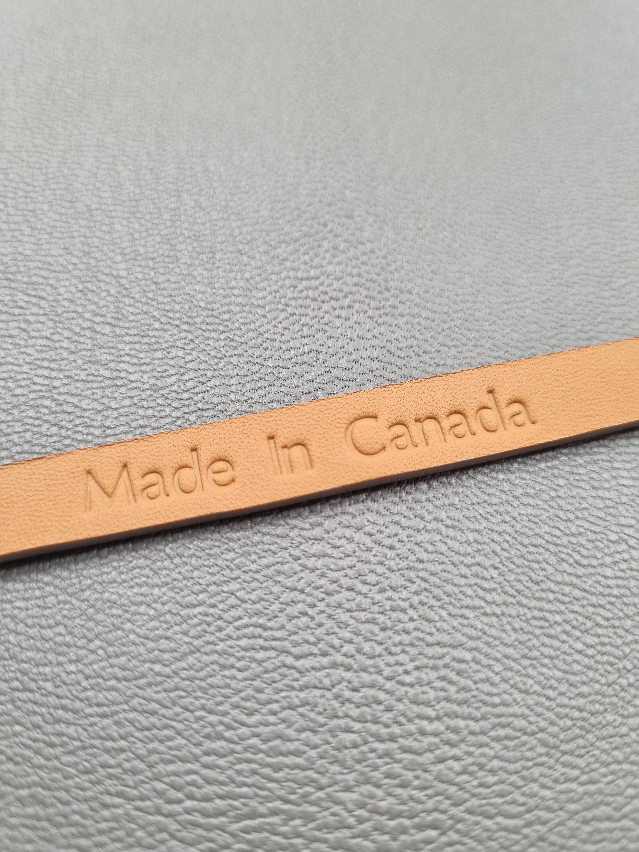 Made in Canada embossed in a grey crocodile clasp bracelet, made by Pila Luxuria in Canada.