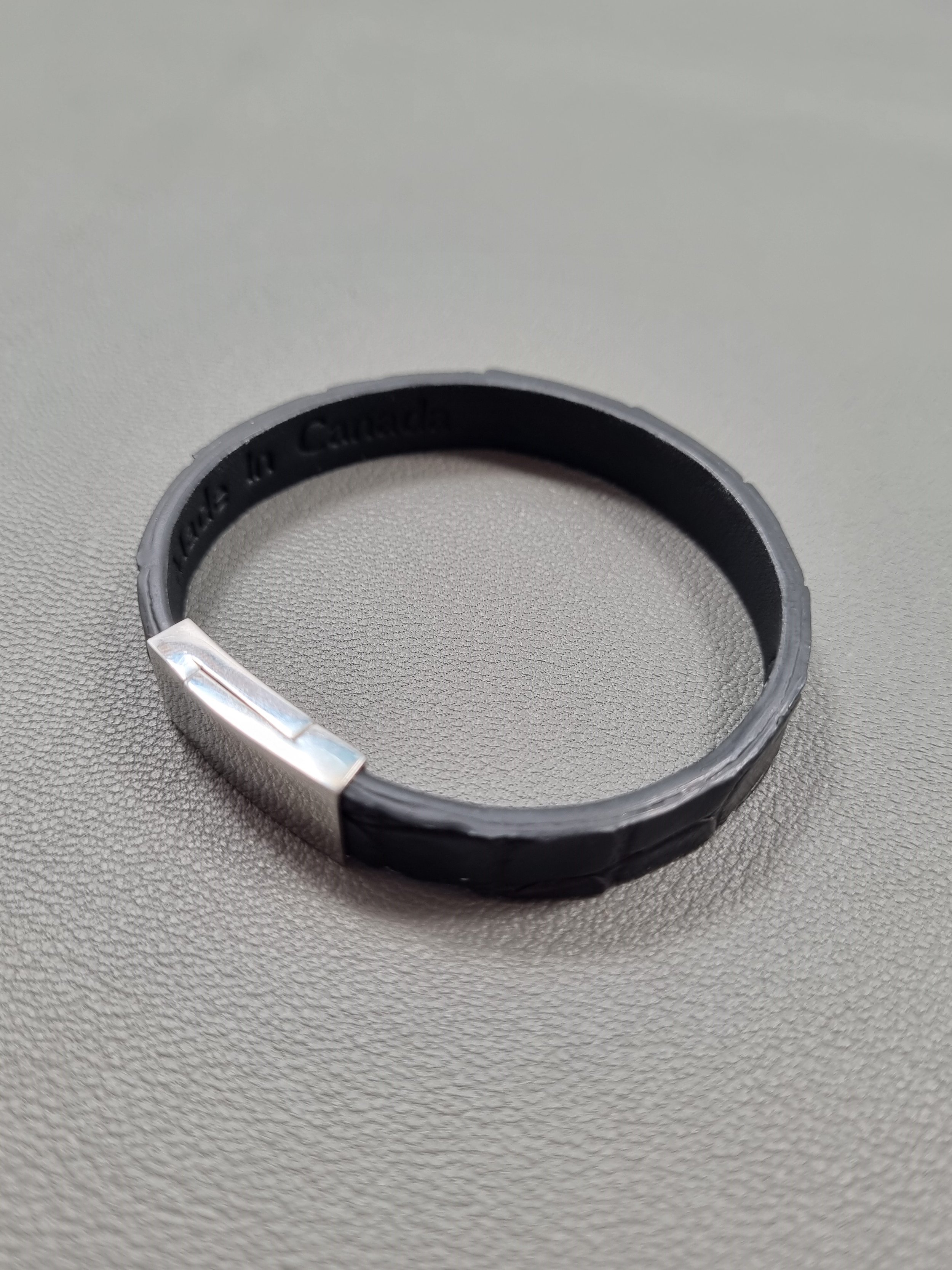 Black crocodile leather bracelet with black calfskin lining.