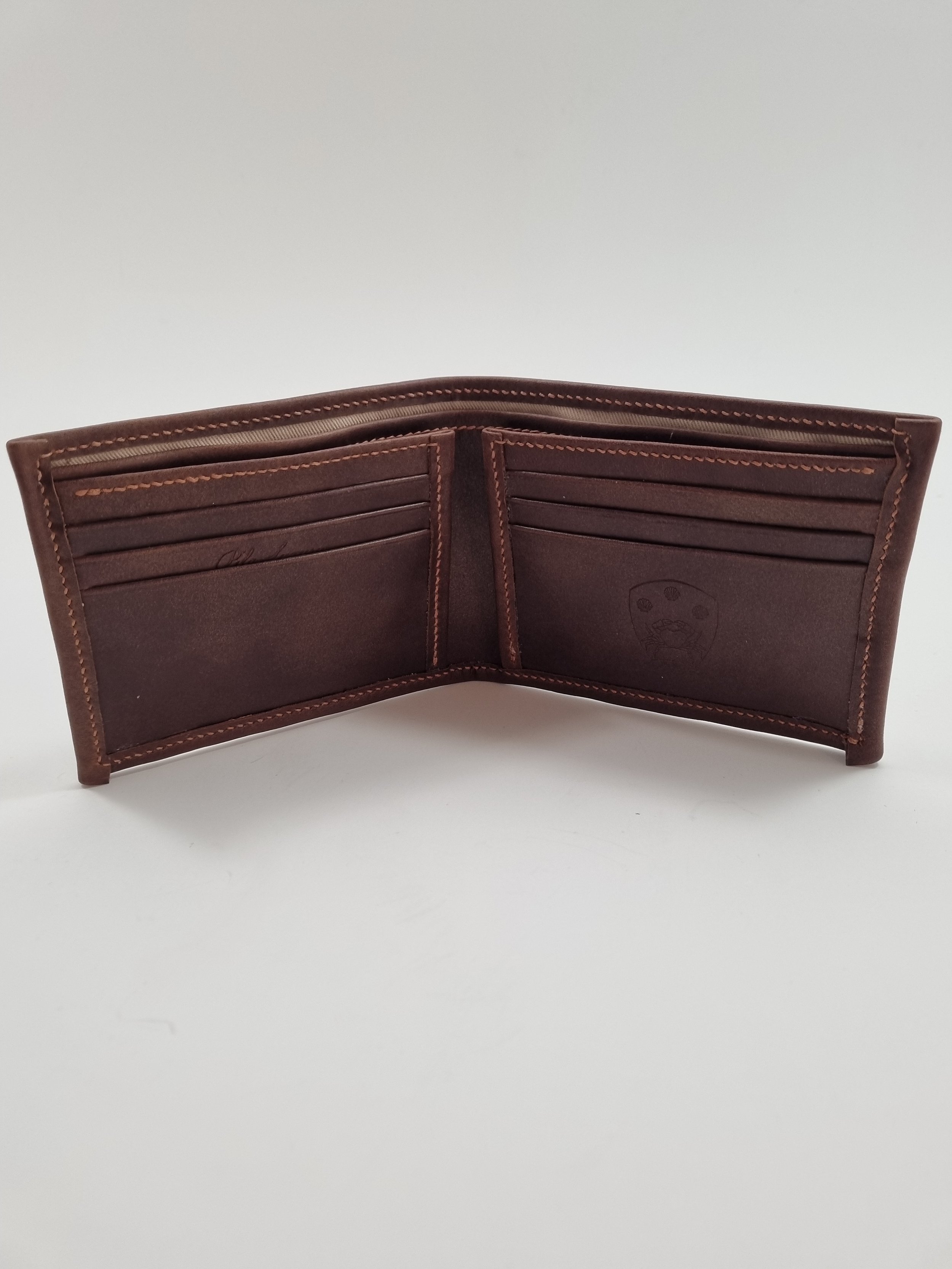 Pila Luxuria Atlas Leather Wallet shown open in brown leather.