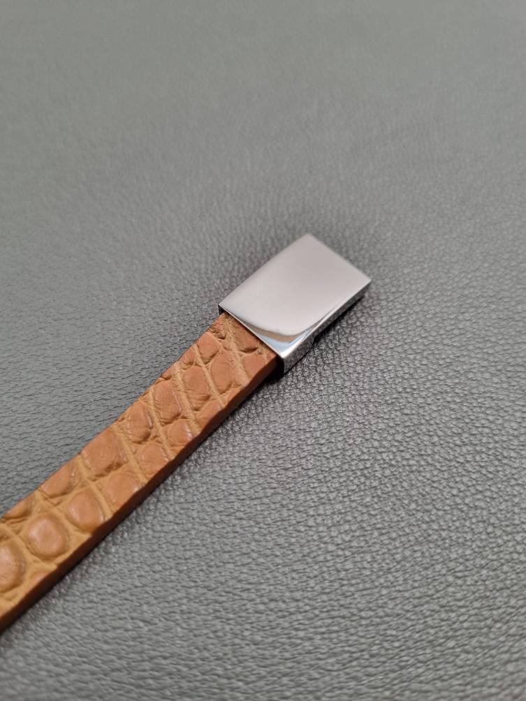 Cognac crocodile leather bracelet with a silver magnetic clasp, made by Pila Luxuria in Canada.