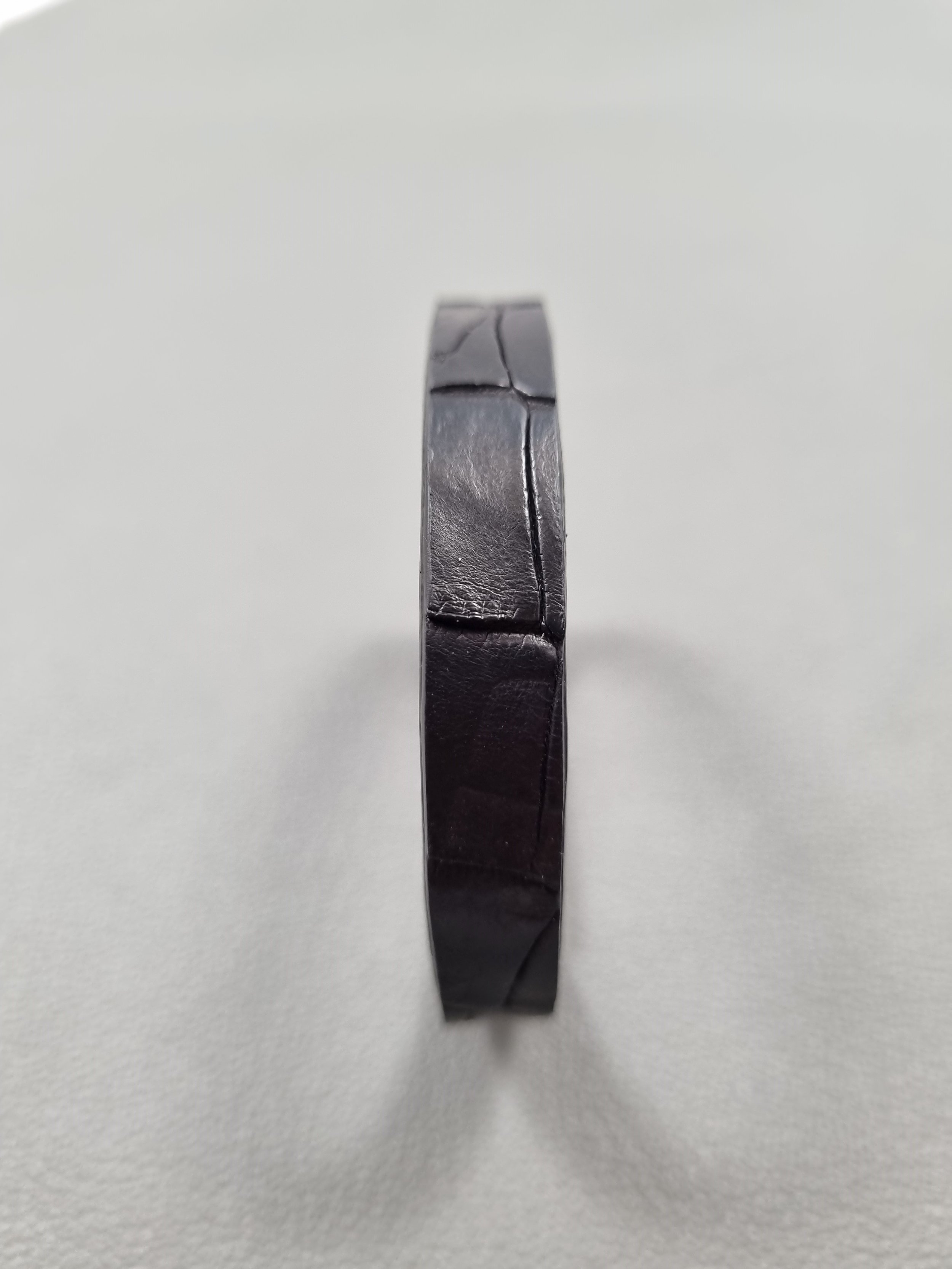 Black crocodile leather bracelet with black calfskin lining.