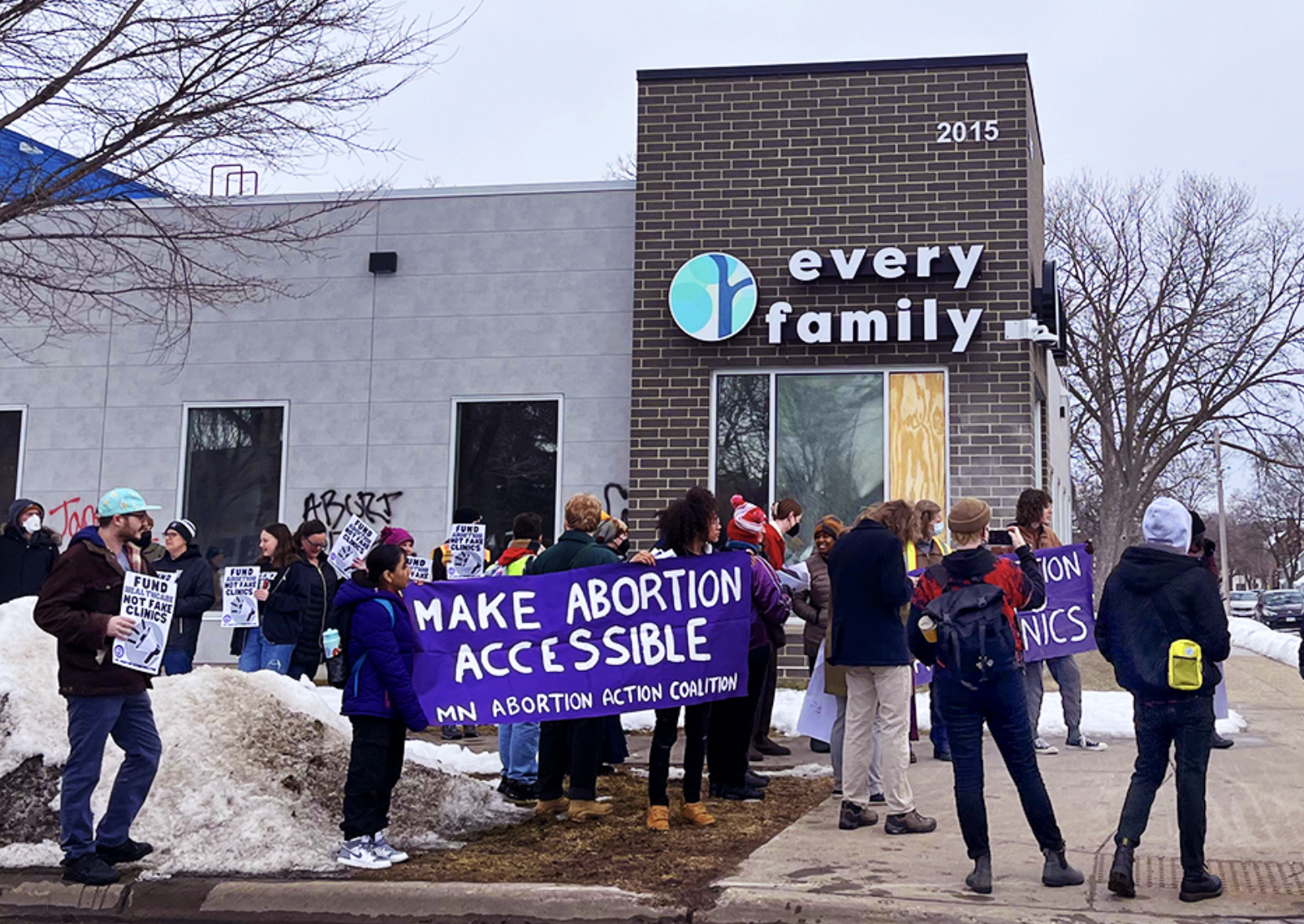 Why did the community protest against a new ‘crisis pregnancy center’ in the Phillips area? 