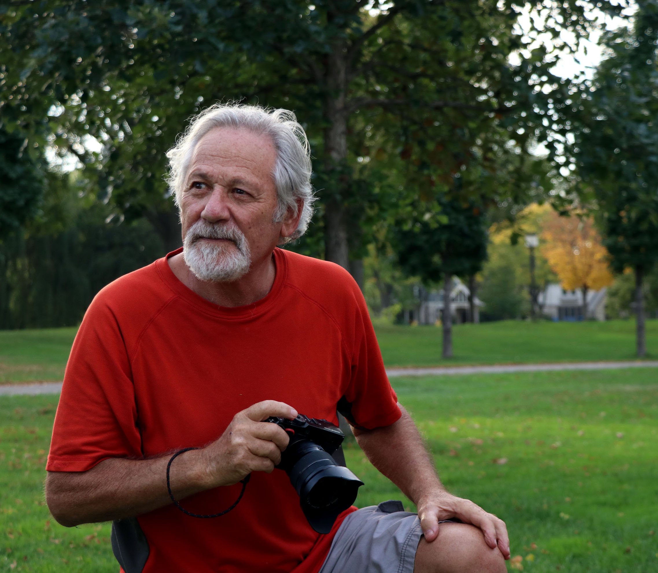 Steven Mendel poses for a portrait at lake Bde Maka Ska in Minneapolis, Minn., on Friday, October 8, 2021. Mendel was photographing a tree stump near Thomas Beach.
"I watched this tree, first when it was alive. And as it has aged, like many of us,