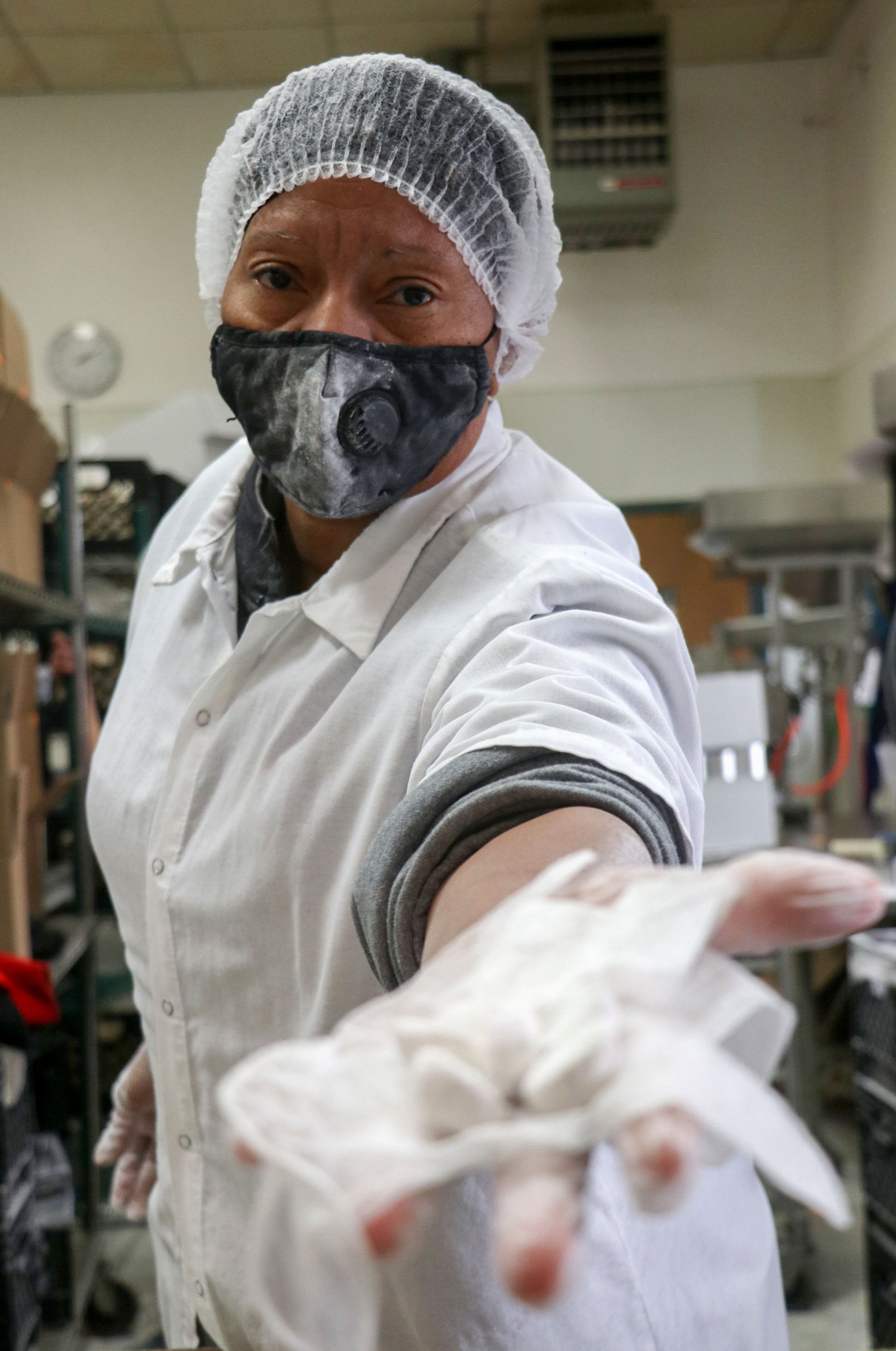 Birddee Jefferson holds the Key lime cookies at Grandma’s Bakery in White Bear Lake, Minn., on Thursday, Dec. 9, 2021. The bakery makes various cookie flavors, but Jefferson’s favorite is Key lime.