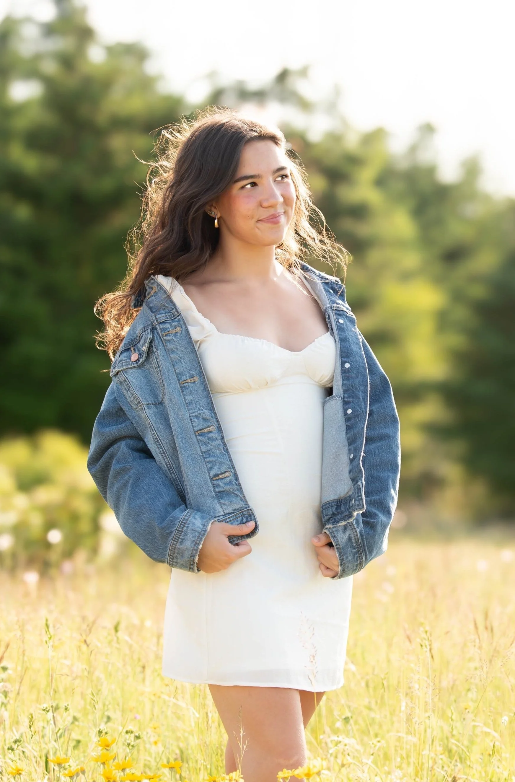 Senior High School Phootshoot, girl, surrounded by greenery and yellow flowers, Portland, OR.
