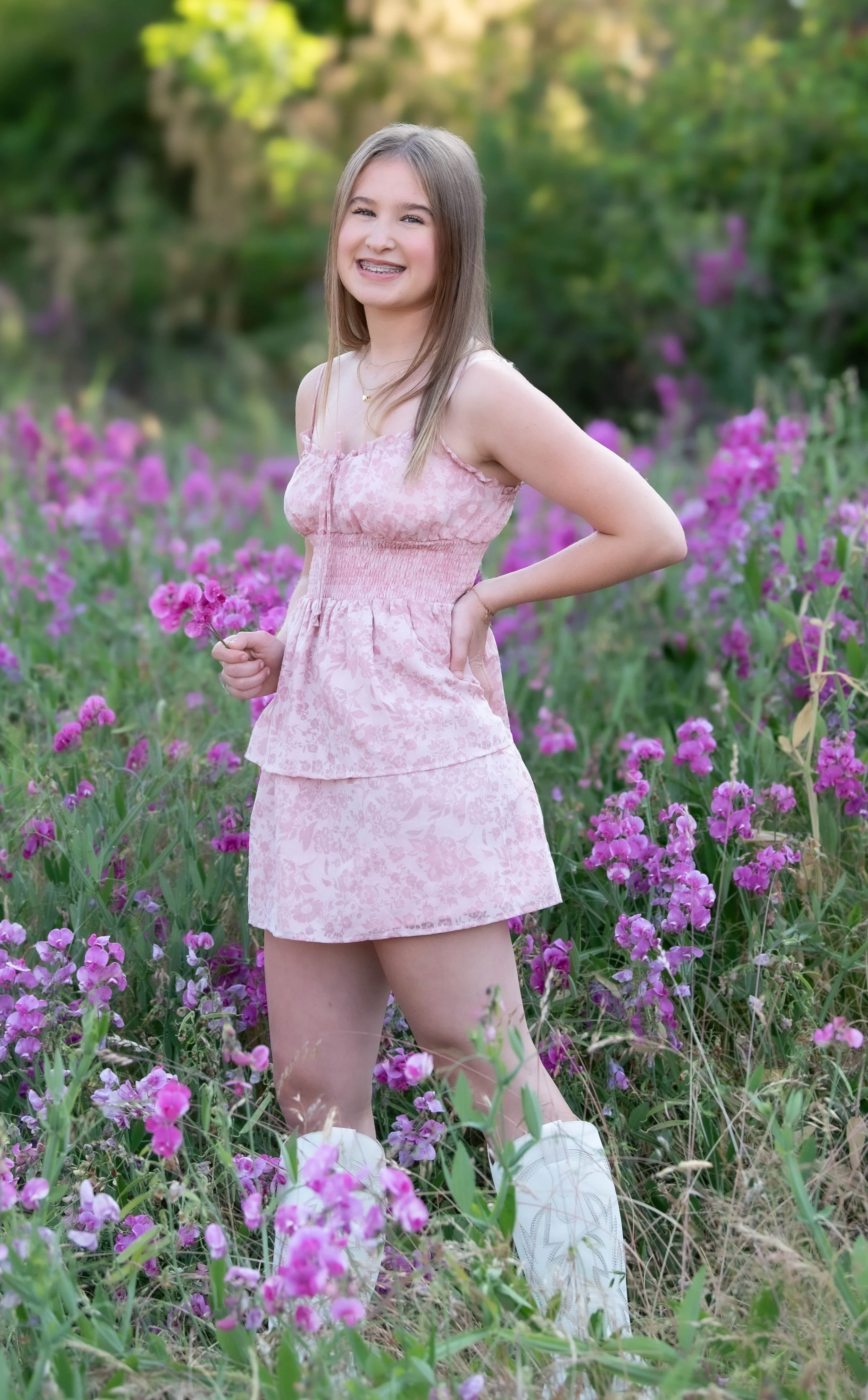 Senior High School photoshoot, standing in a field of pink and purple flowers. PDX