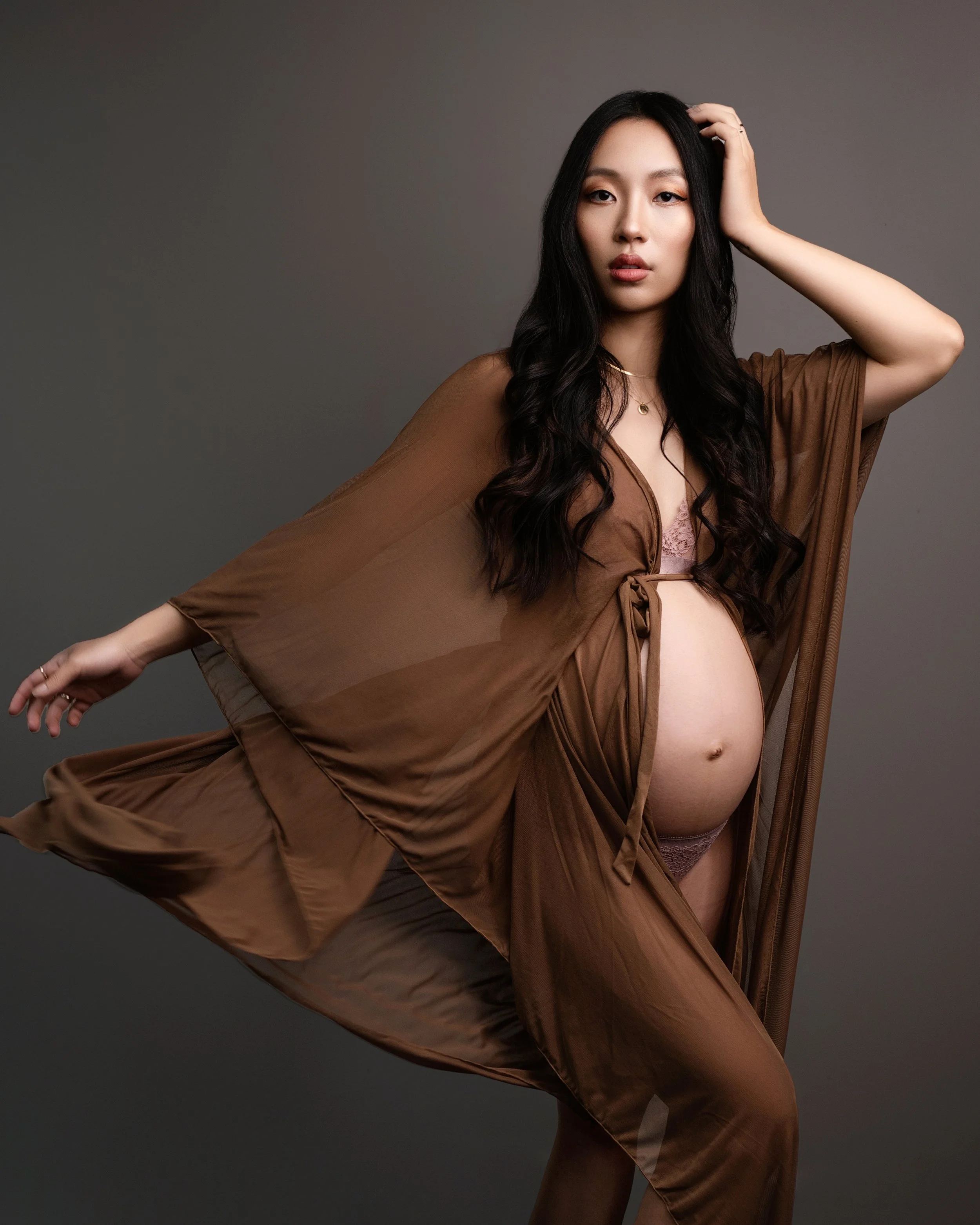 Maternity boudoir in studio just hits differently. 

Maternity boudoir is easily one of my favourite things to photograph. Afterall - boudoir honours you, and your body where you are at right now. 

What better way to do that than to create art aroun