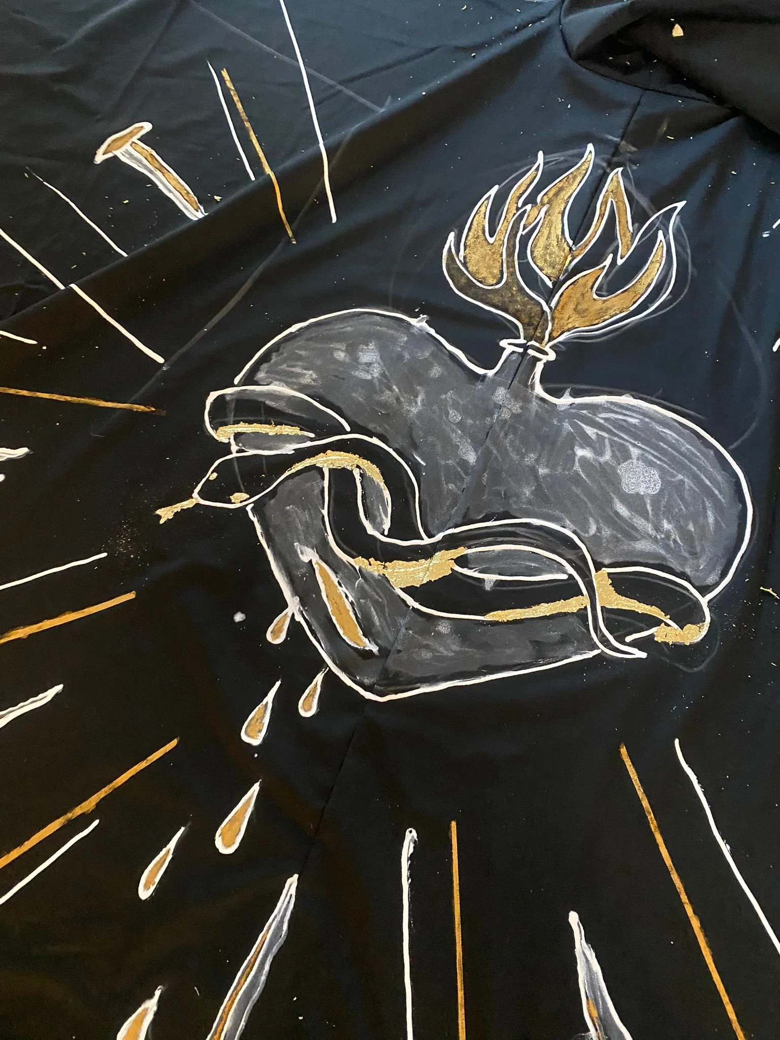 🌟 Behind the scenes of our upcoming performance: crafting costumes and artworks, including 99 hand-gilded bats&mdash;symbols to smash through barriers.

During the show, 5 of these bats will be ceremonially blessed, each imbued with the intention to