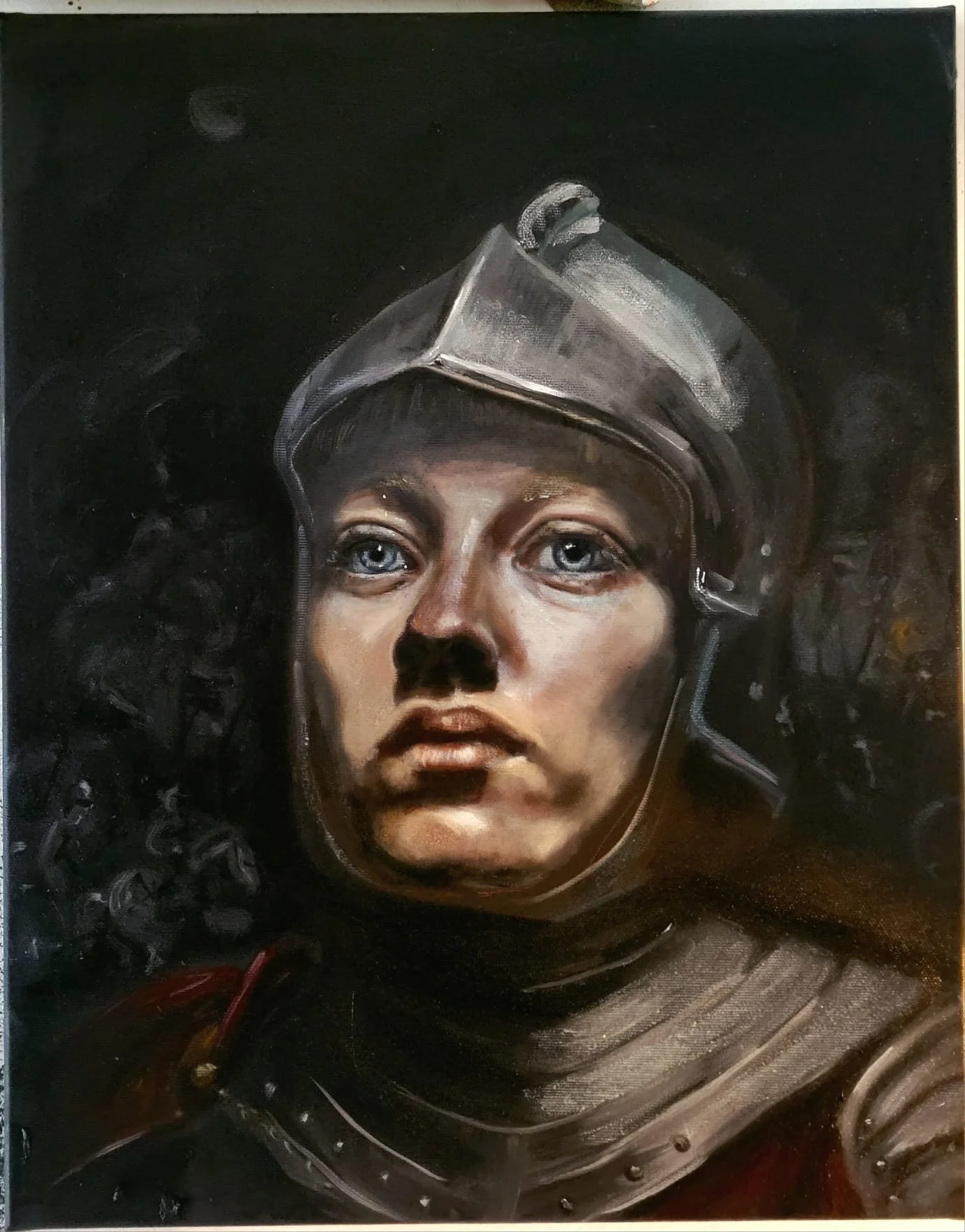 Portrait of Joan of Arc as a young rebellious woman wearing an armor