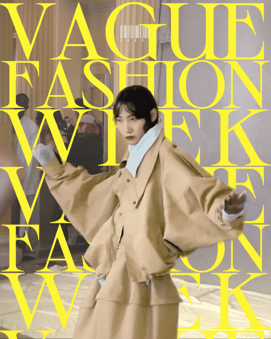 A video collage of a model of East Asian heritage with short jet black hair gelled down into finger waves moves between poses, arms swaying against a studio backdrop with the words "Vague Fashion Week" emblazoned in yellow all-caps text