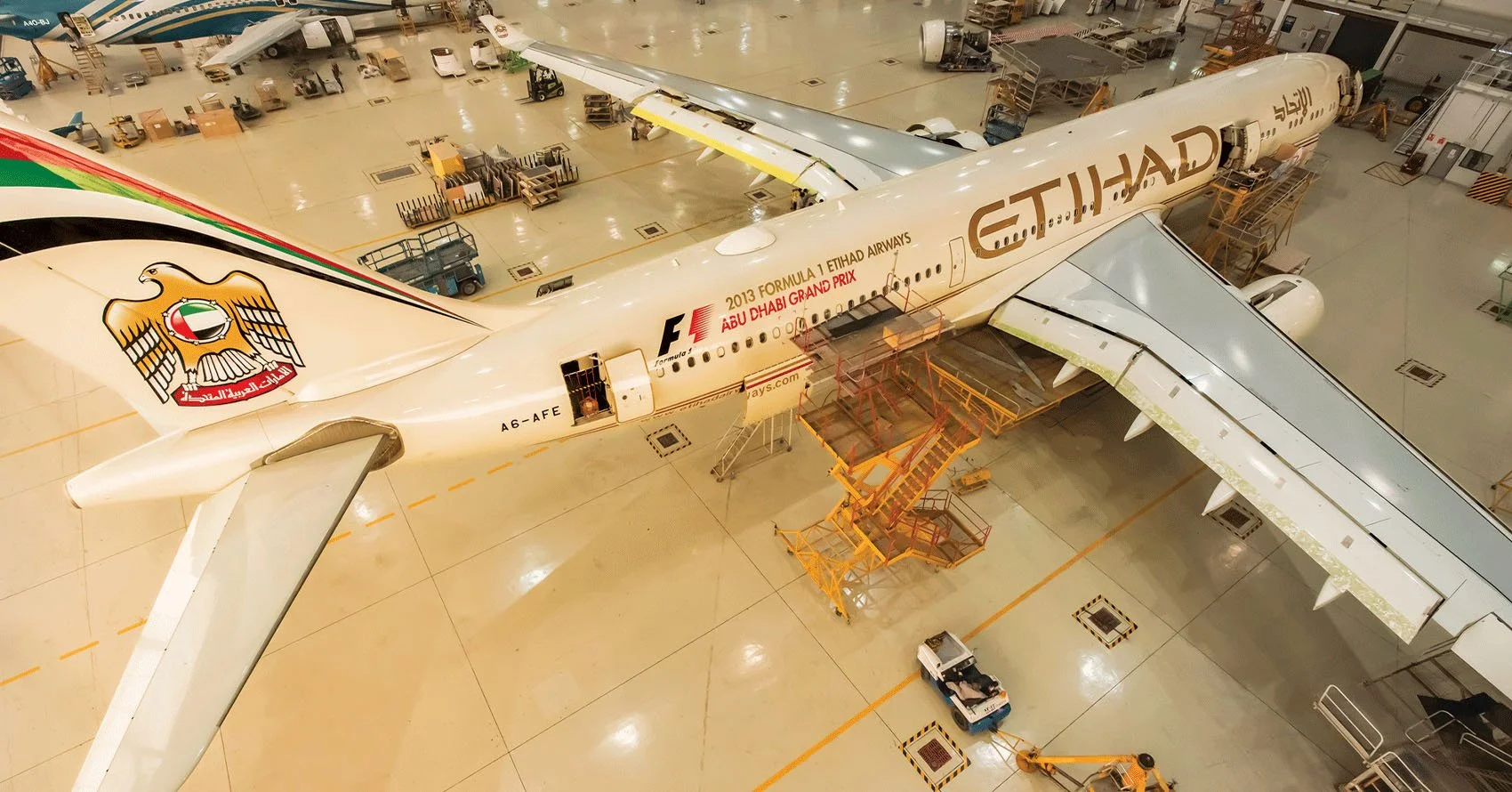 Etihad print design for anniversary book location photography of plane