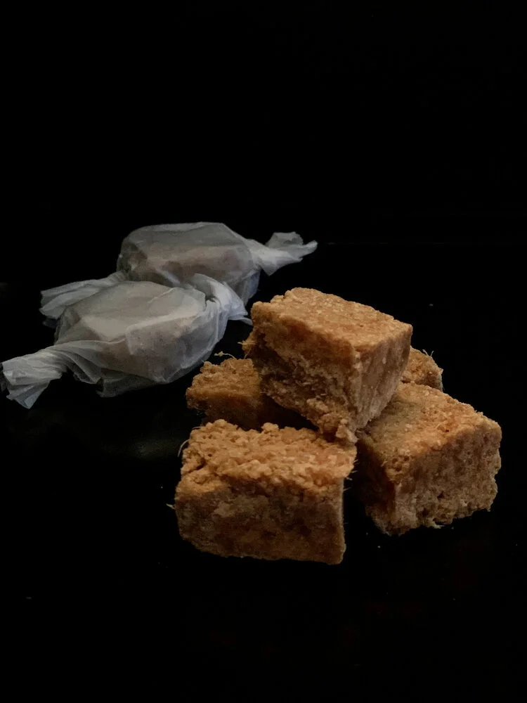 Pretty Caucasian woman at the beach smiling at camera.