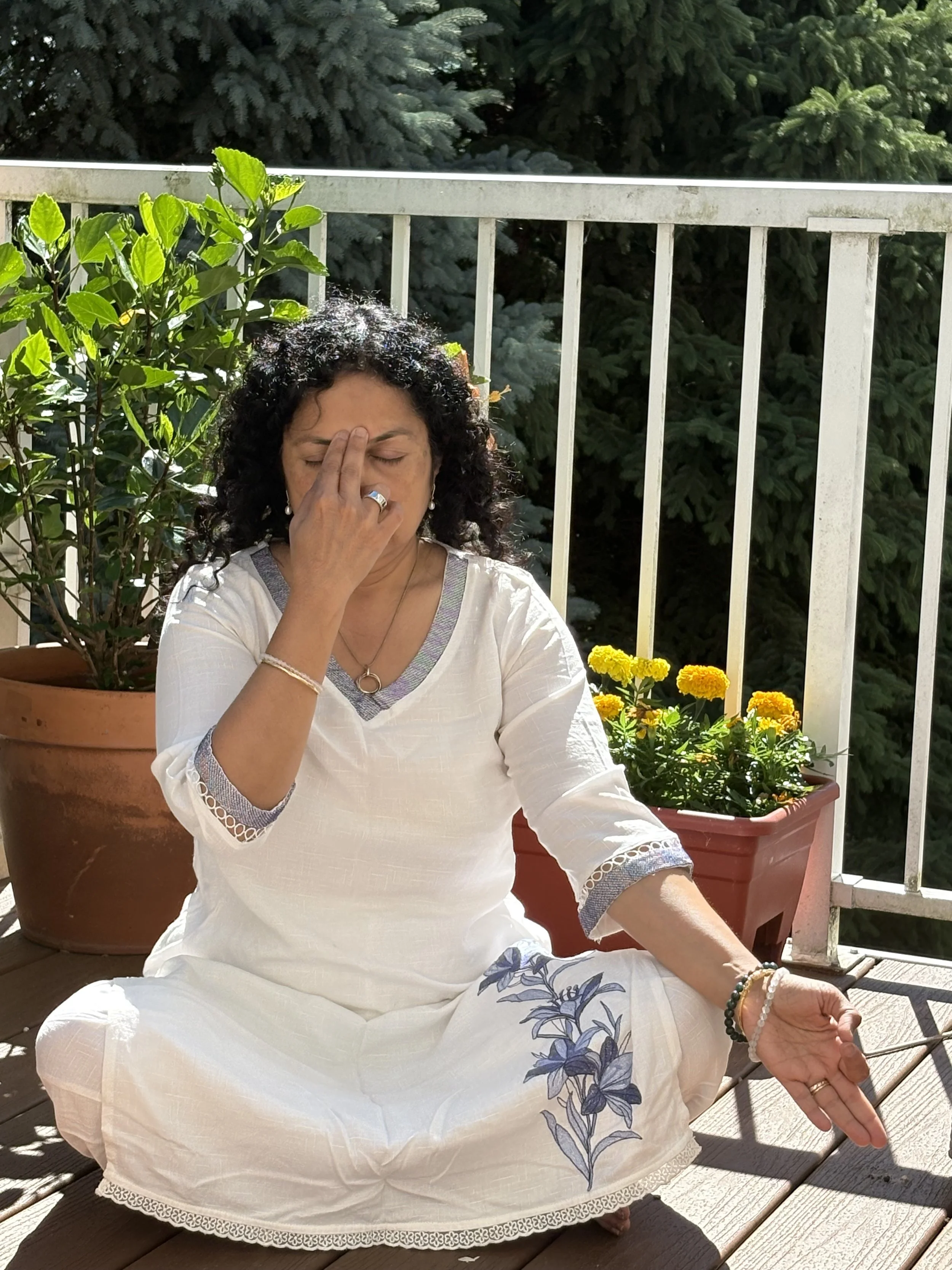 A girl doing breath work to reduce stress and anxiety