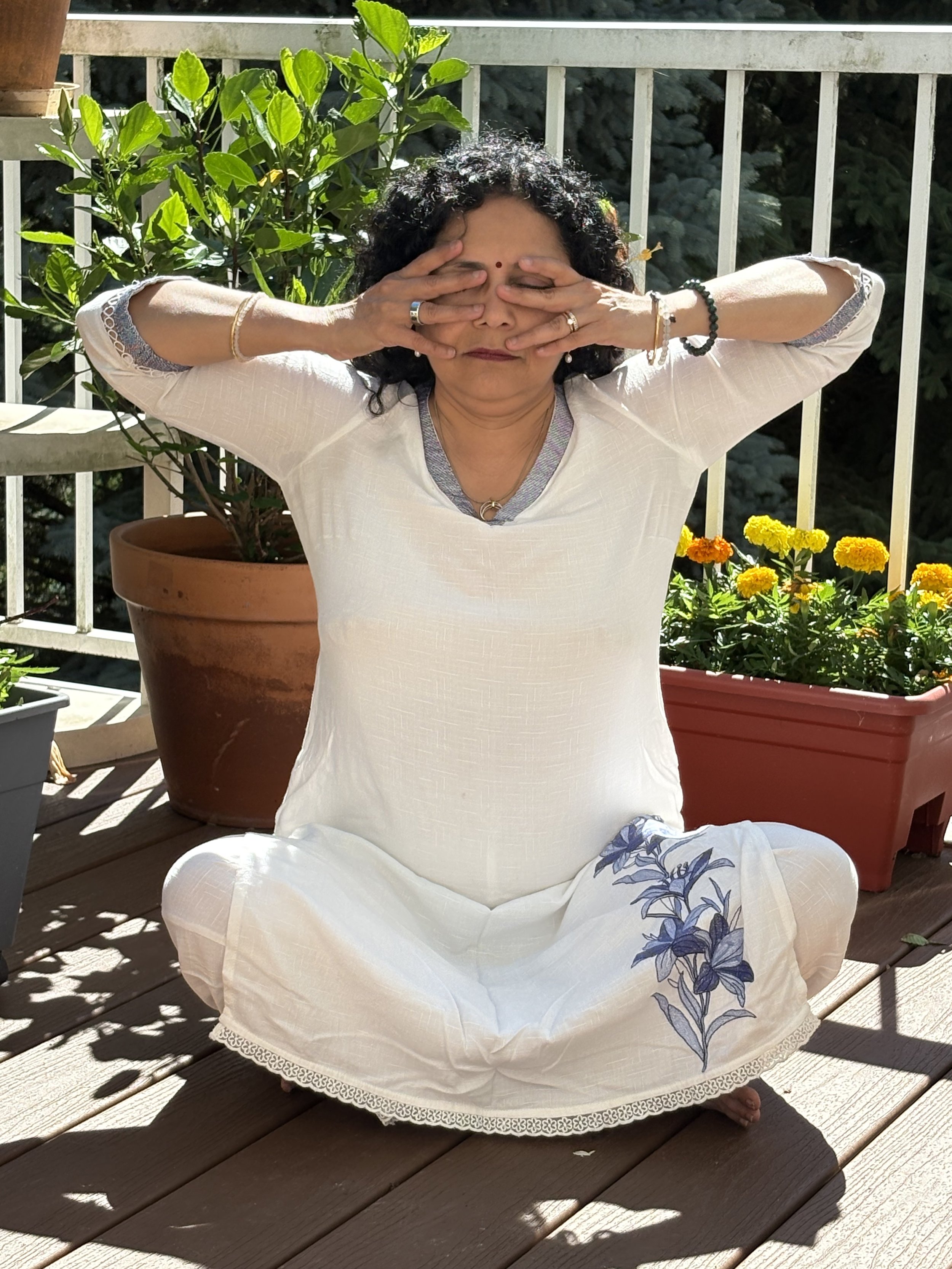 A girl doing pranayama to reduce anxiety