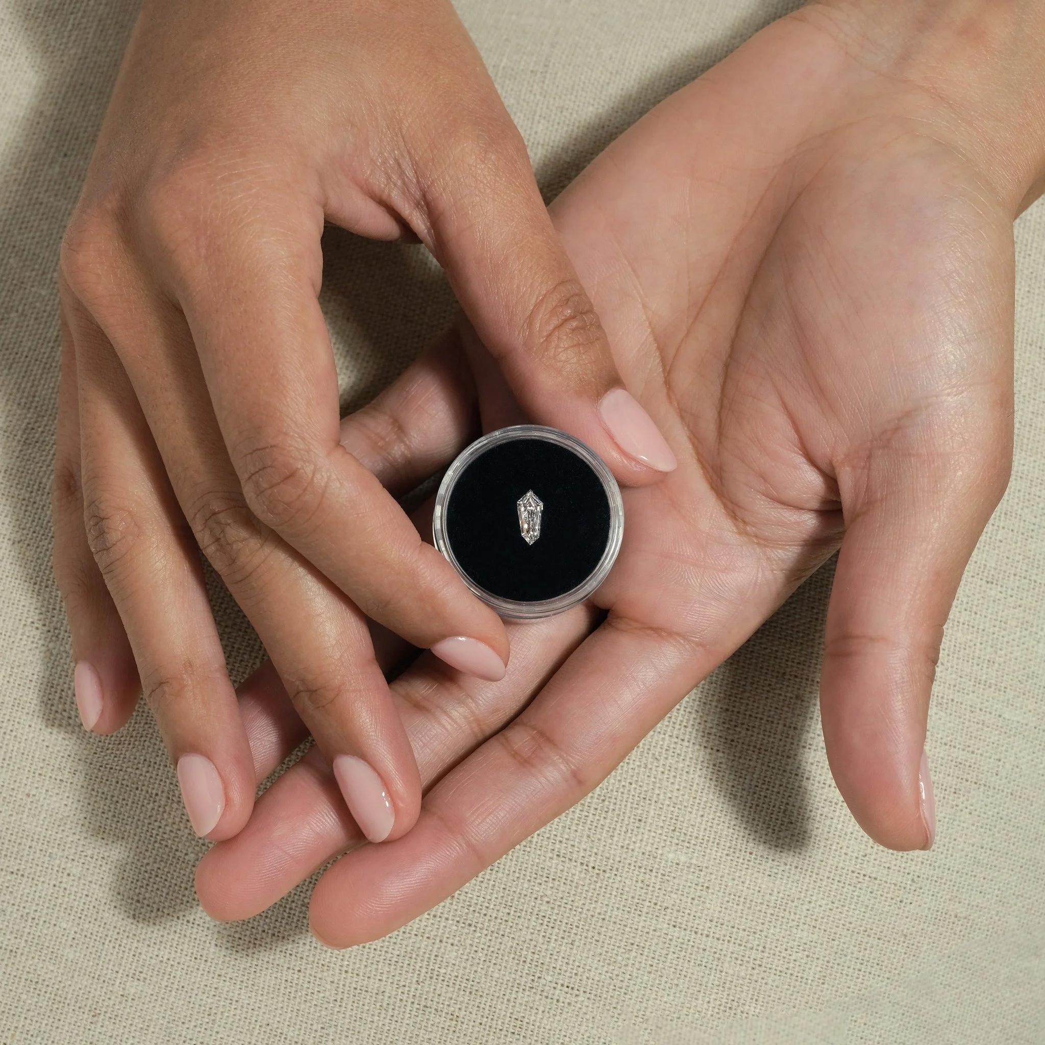 Bespoke jewellery, made personal. Choose your preferred gemstones or diamonds, including unusual cuts such as the shield cut diamond, each hand-picked by our founder and designer Edward Xu for their unique character and beauty.

Handmade in our Londo