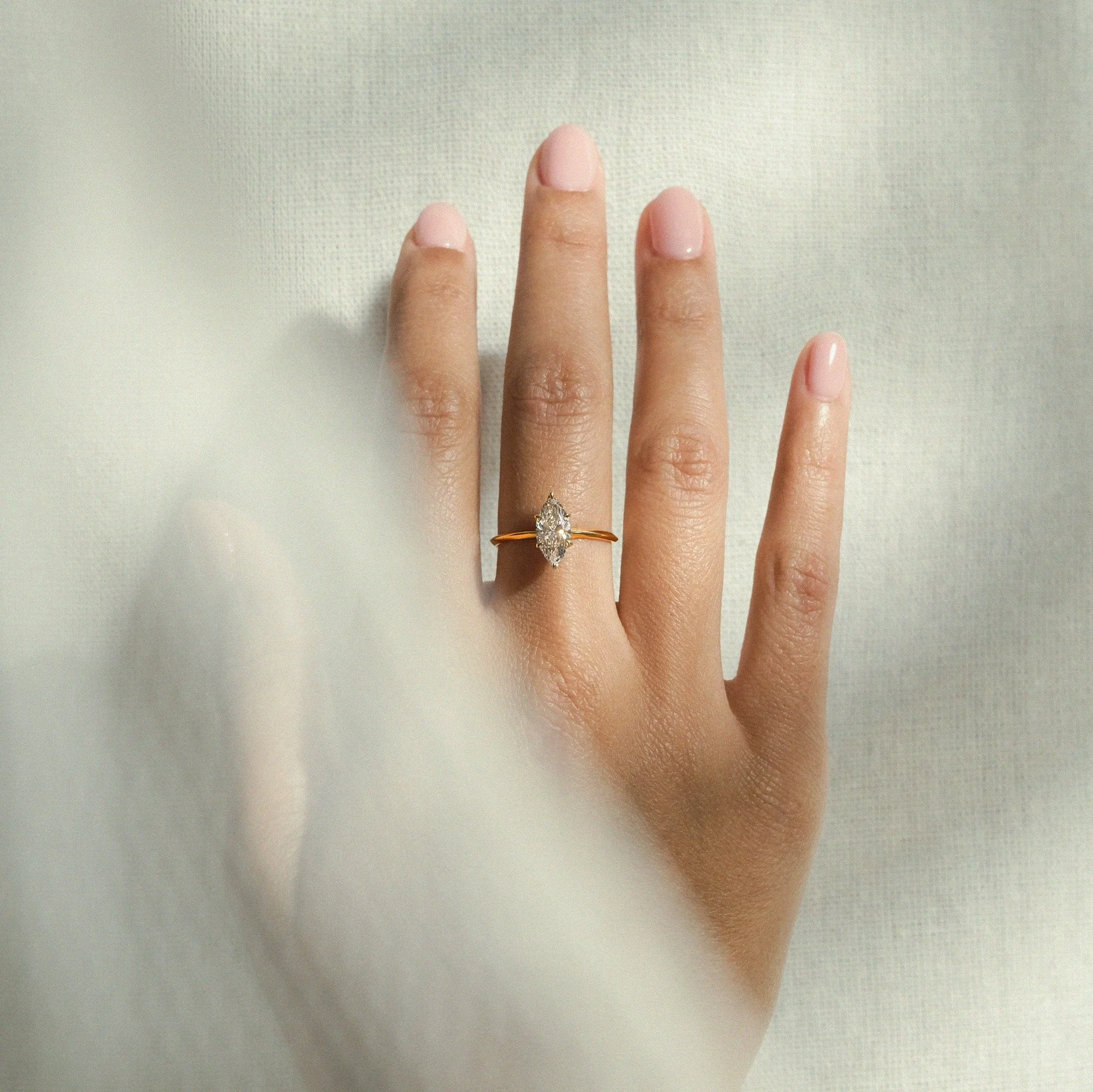 Inspired by Thea, a Mayan word symbolising a goddess and divine gift, the Thea Ring unites ancient mysticism with contemporary sophistication. A softly twisted blade echoes the angular lines of sacred temples, while a brilliant diamond is held in a t