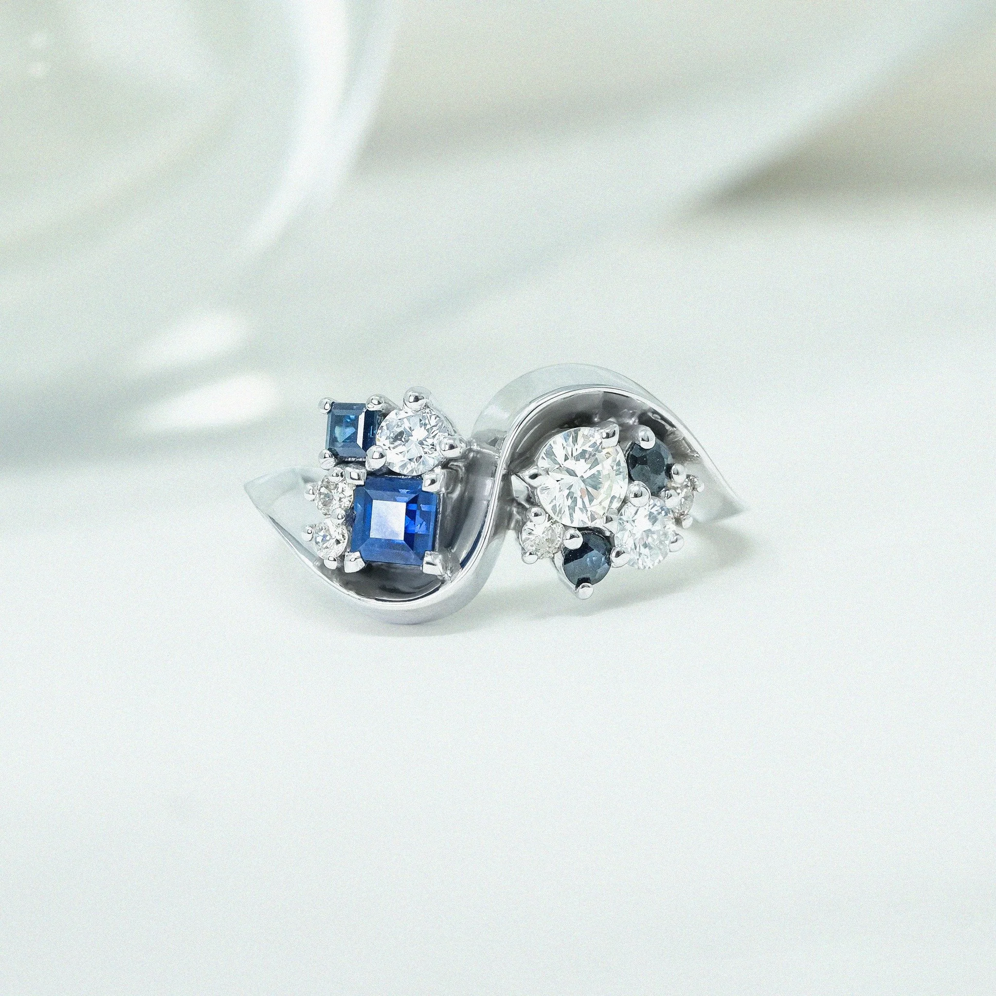 Grandmother&rsquo;s heirlooms, reimagined. A beautiful bridge between the past and the present.

The Sireen Ring reimagines a client&rsquo;s cherished family heirlooms, transforming her grandmother&rsquo;s original diamonds and sapphires into a conte