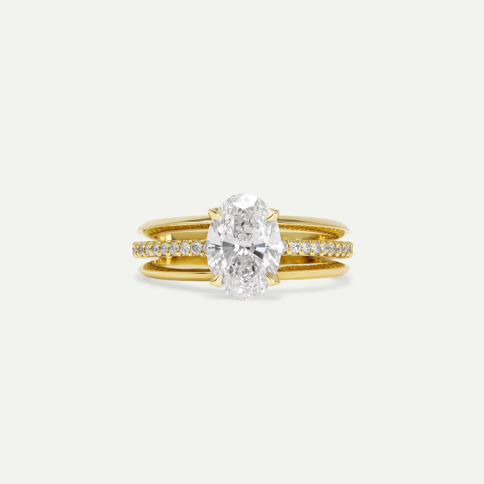 Maeve modern alternative engagement ring features a centre oval-cut diamond with architectural 3-band design with small diamond pave from EDXU bespoke jeweller London