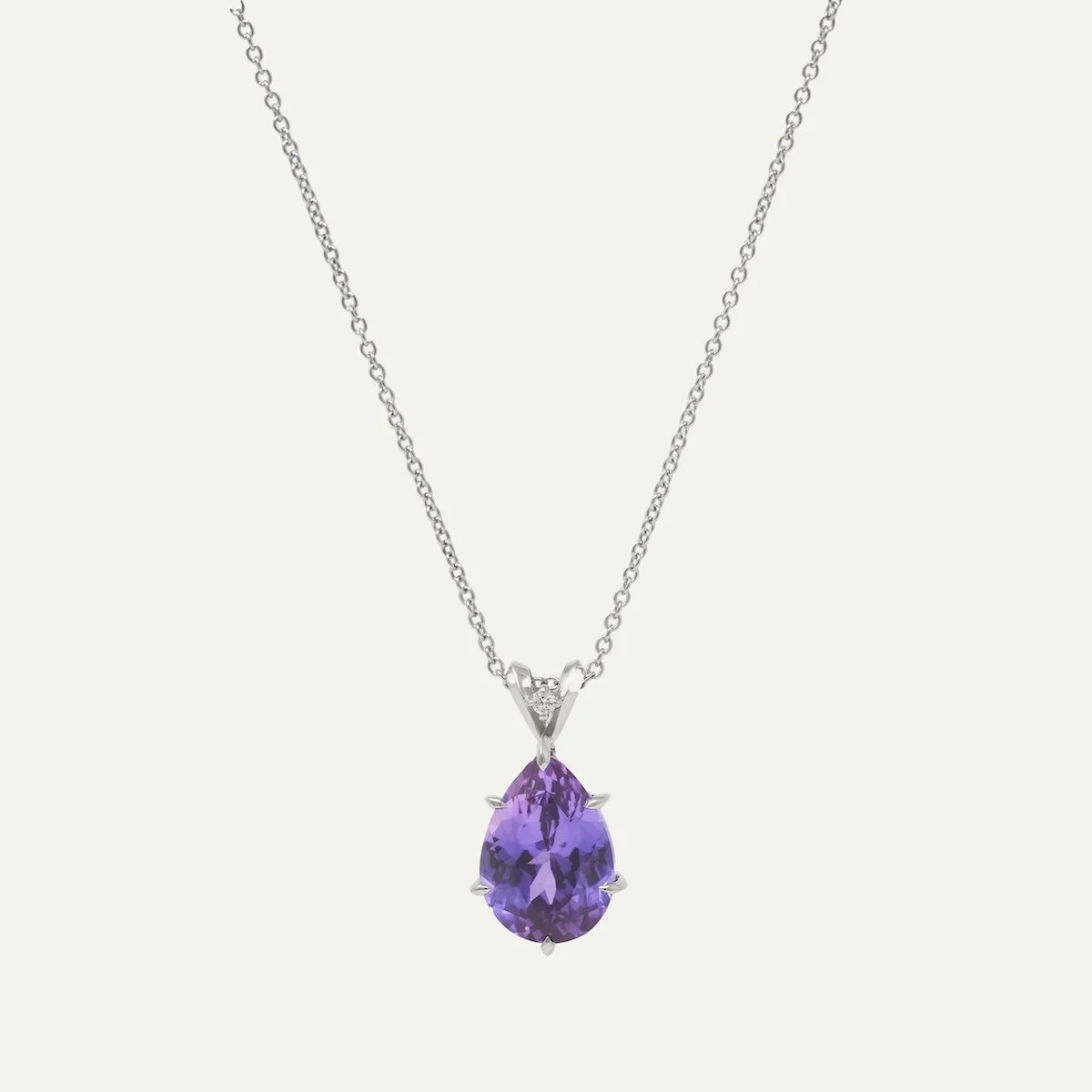Platinum custom necklace with purple sapphire and round diamond from EDXU Bespoke jeweller London