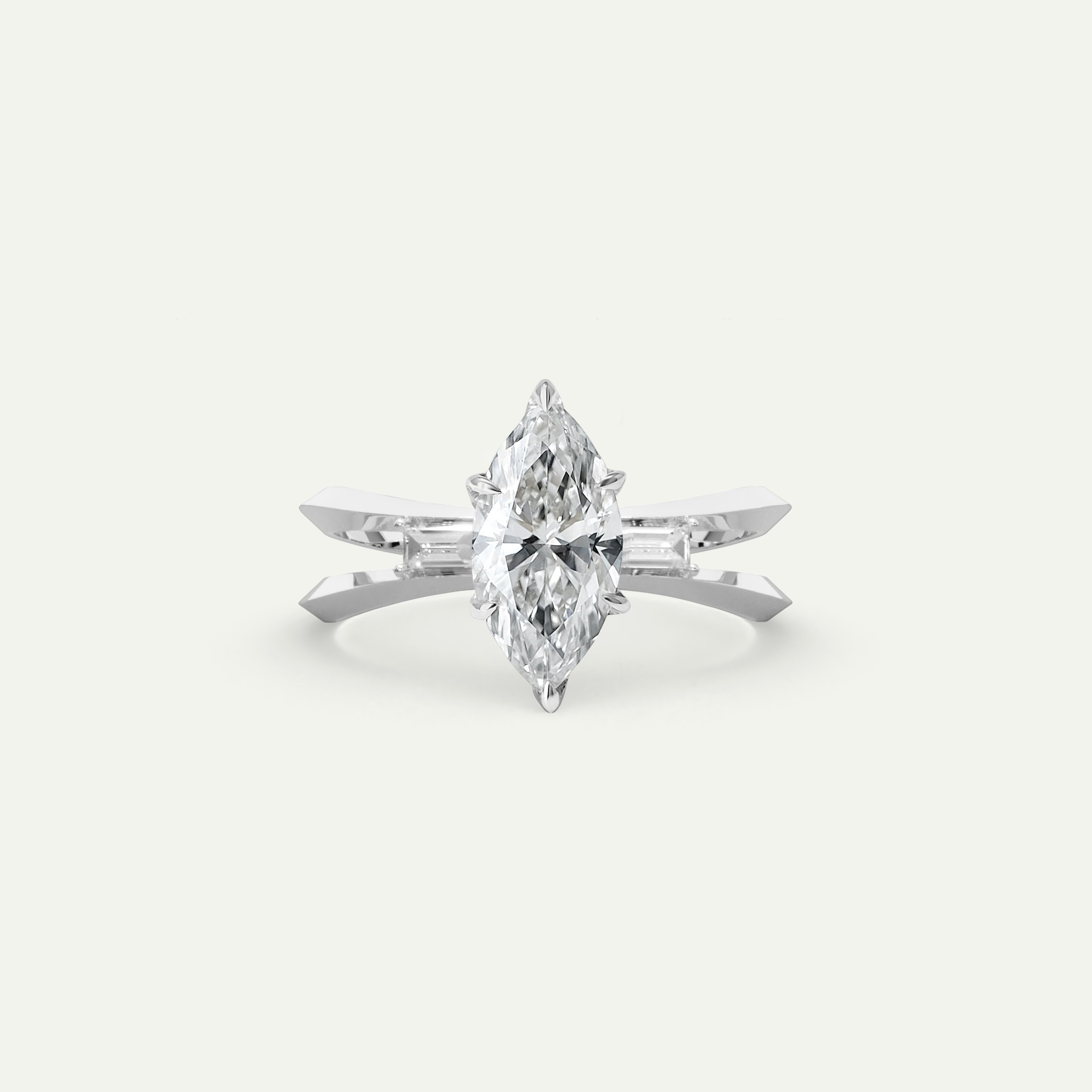 Akna Ring in shiny highly polished finish platinum with marquise-cut white diamonds and two small emerald-cut accent white diamonds EDXU London front product photo