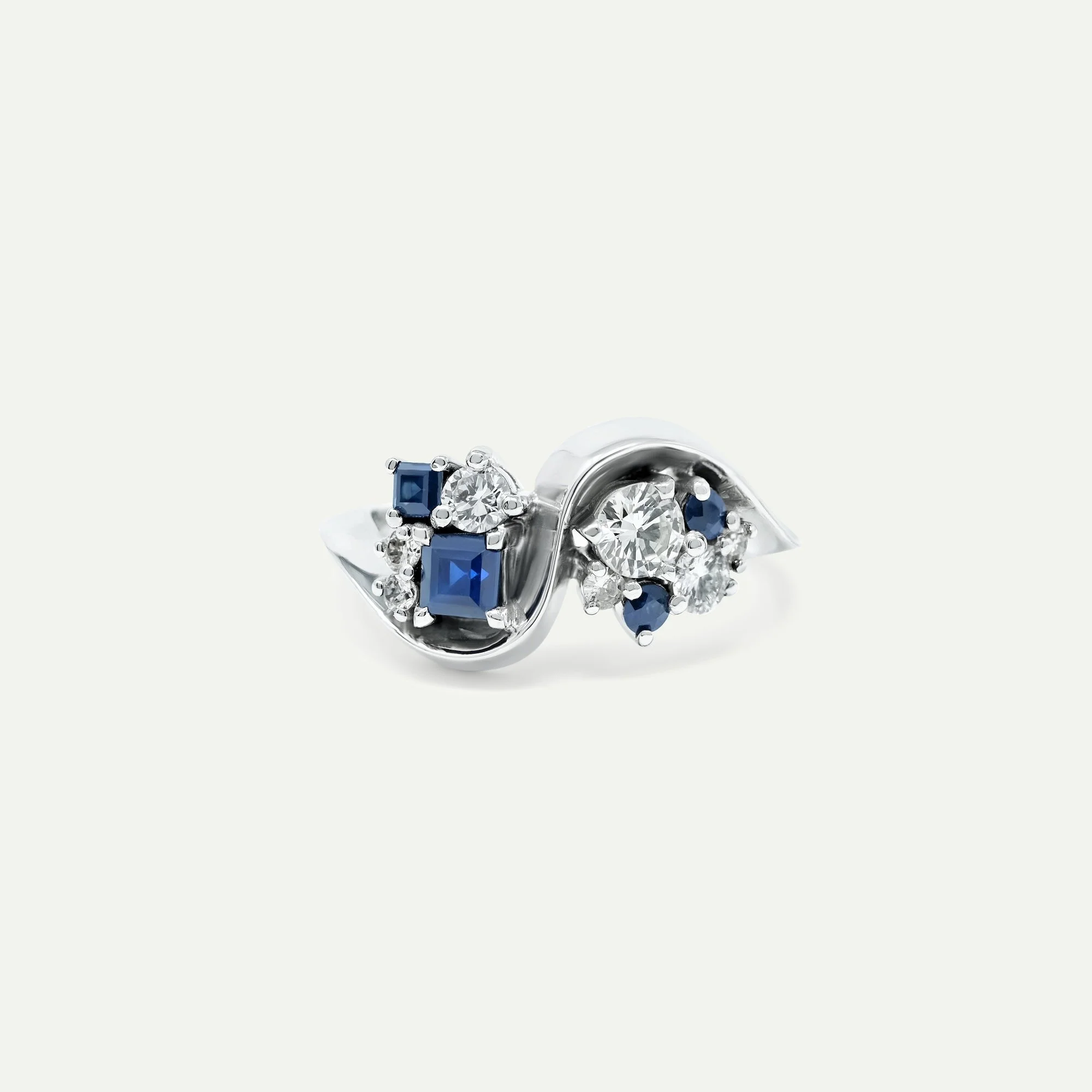 Sireen ring in Platinum with various sizes of antique white diamonds and sapphires from EDXU London bespoke