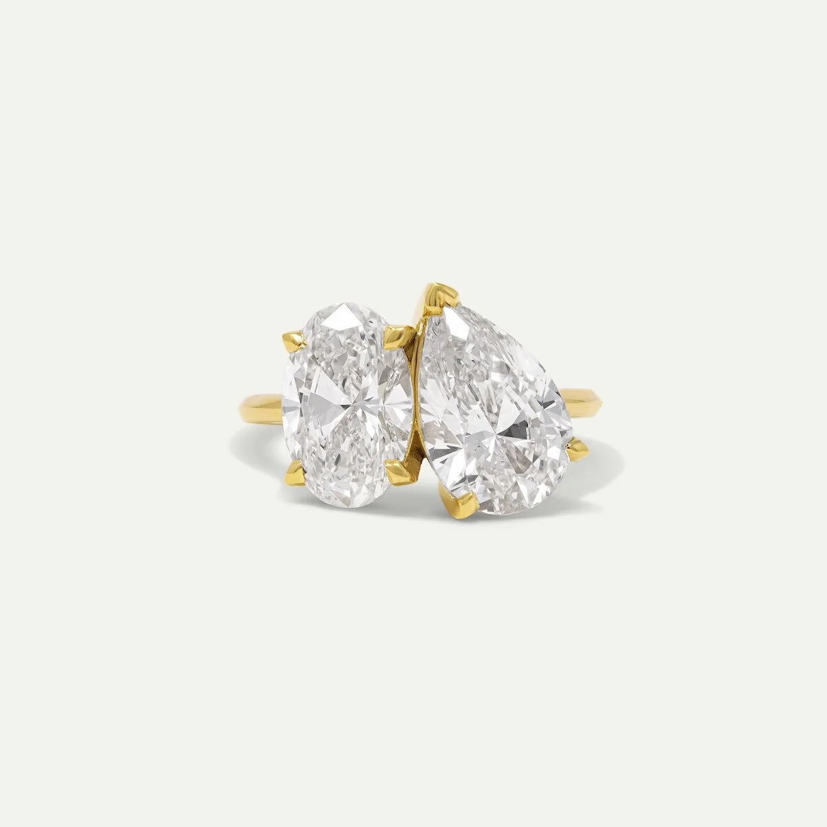 Bespoke engagement ring Jorfar Ring in 18ct yellow gold with pear and oval-cut white diamonds from EDXU Custom jeweller London