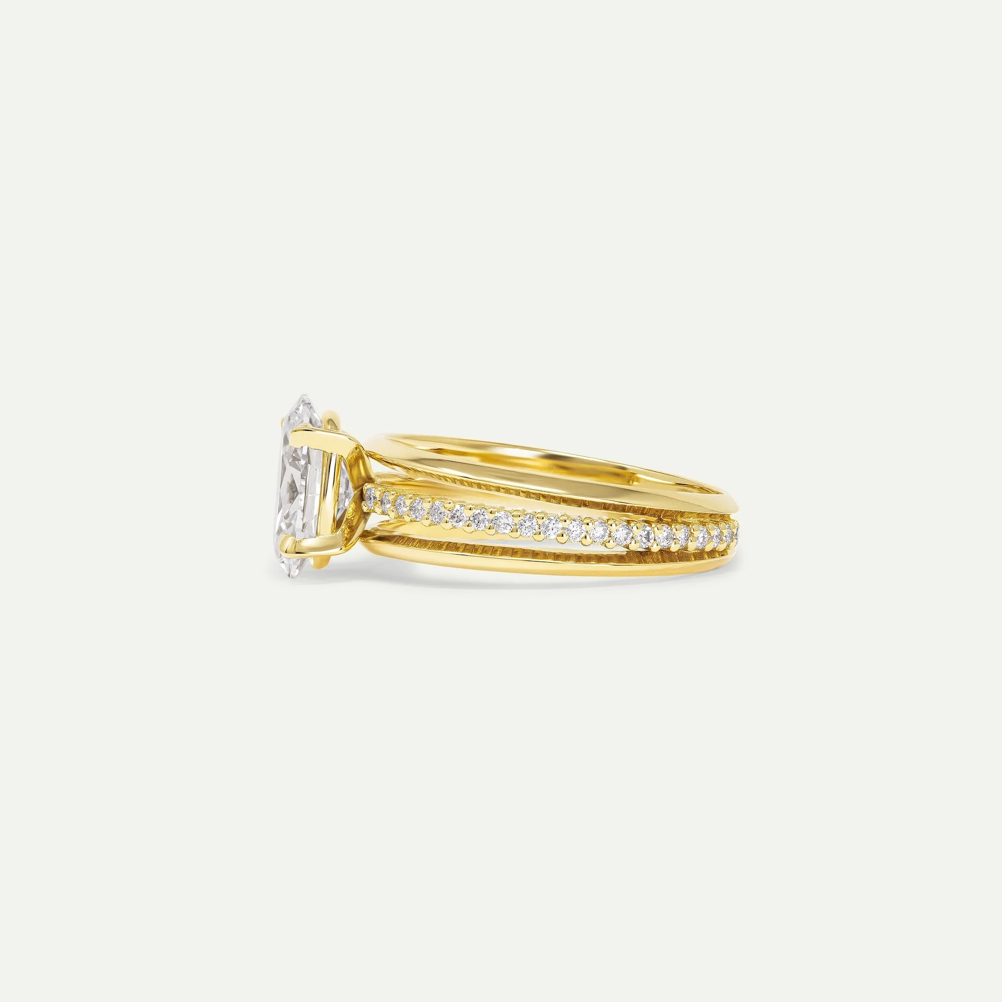 Maeve modern alternative engagement ring features a centre oval-cut diamond with architectural 3-band design with small diamond pave from EDXU bespoke jeweller London side view