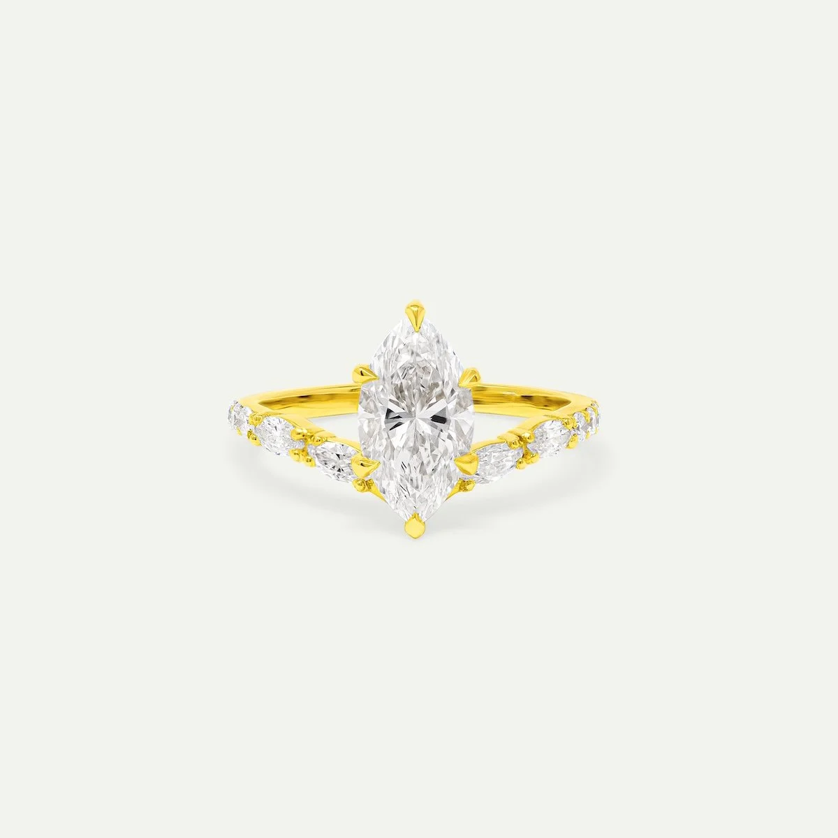 alternative engagement ring in 18ct yellow gold with marquise and round brilliant-cut white diamonds from EDXU bespoke jeweller London