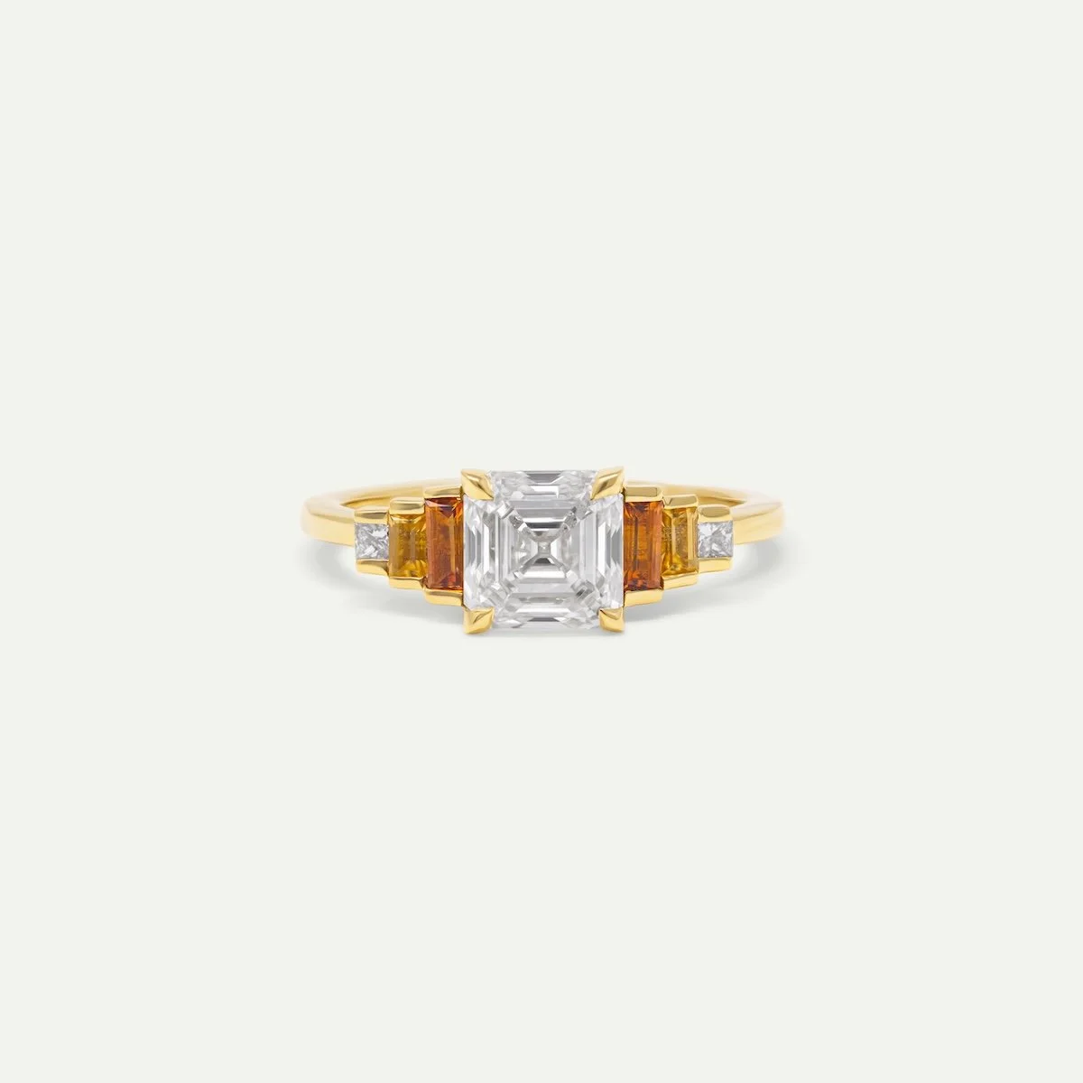 Design you own engagement ring of 18ct yellow gold with square emerald-cut white diamond and small citrines, sapphires and diamonds from EDXU Bespoke Jeweller London
