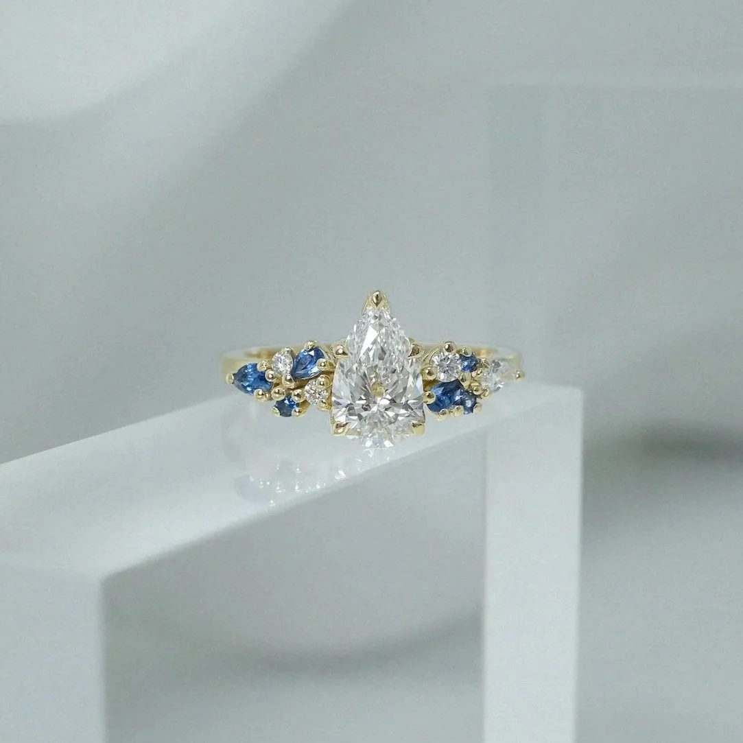 EDXU London bespoke Bendio engagement wedding rings in 18k yellow gold with emerald-cut yellow sapphire and white diamonds pave 