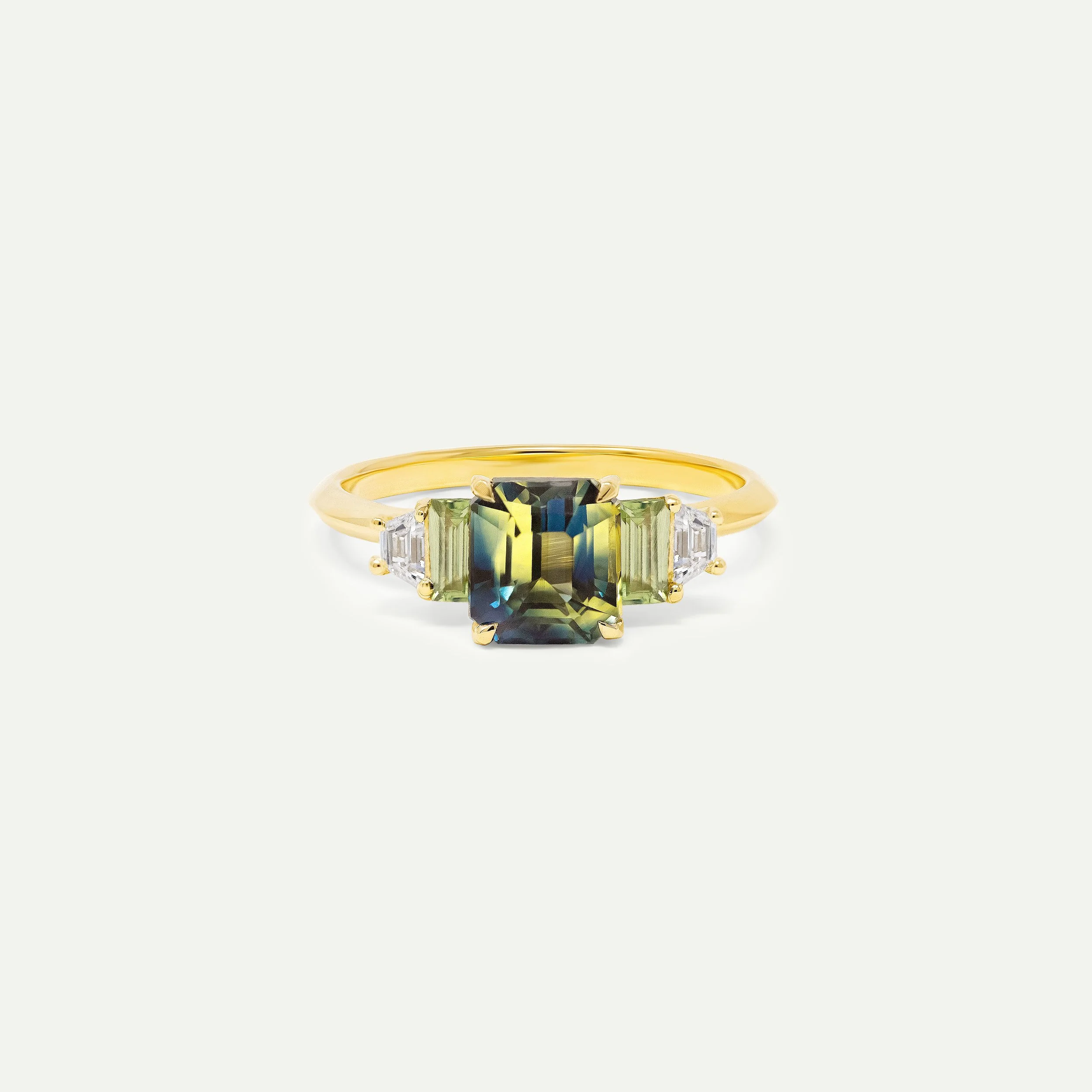 Purvan ring in 18ct yellow gold with bi-colour sapphire with mint green sapphire and trapezoid white diamonds accent stones edxu London bespoke