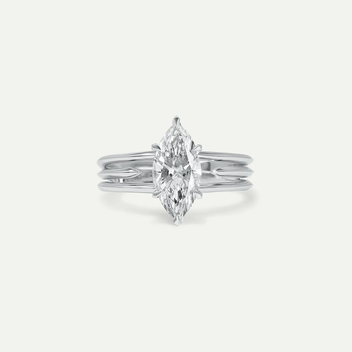 alternative engagement ring in platinum with marquise-cut white diamonds from EDXU bespoke jeweller London