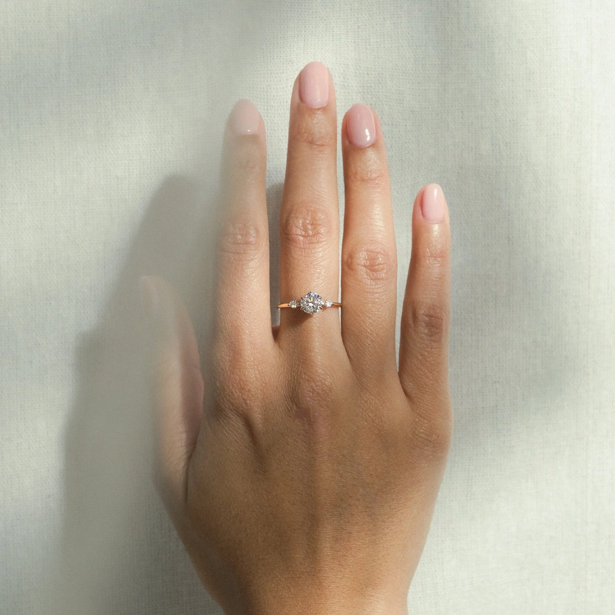 amelia-ring-round-diamond-engagement-edxulondon-lifestyle-crop copy.jpg