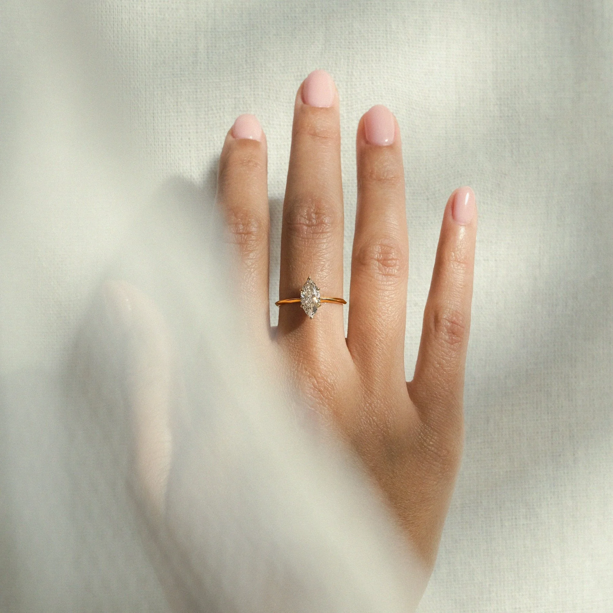 thea-ring-marquise-diamond-engagement-edxulondon-lifestyle-crop copy.jpg