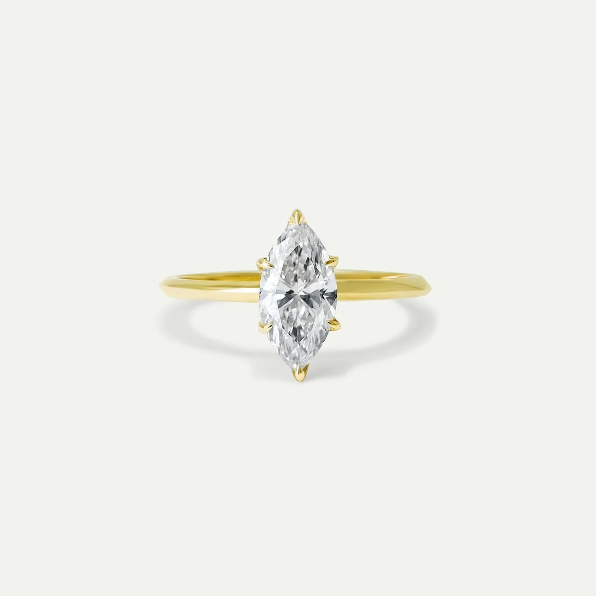 Minimalist modern engagement ring Thea in 18ct yellow gold with marquise-cut white diamond from EDXU bespoke jeweller London