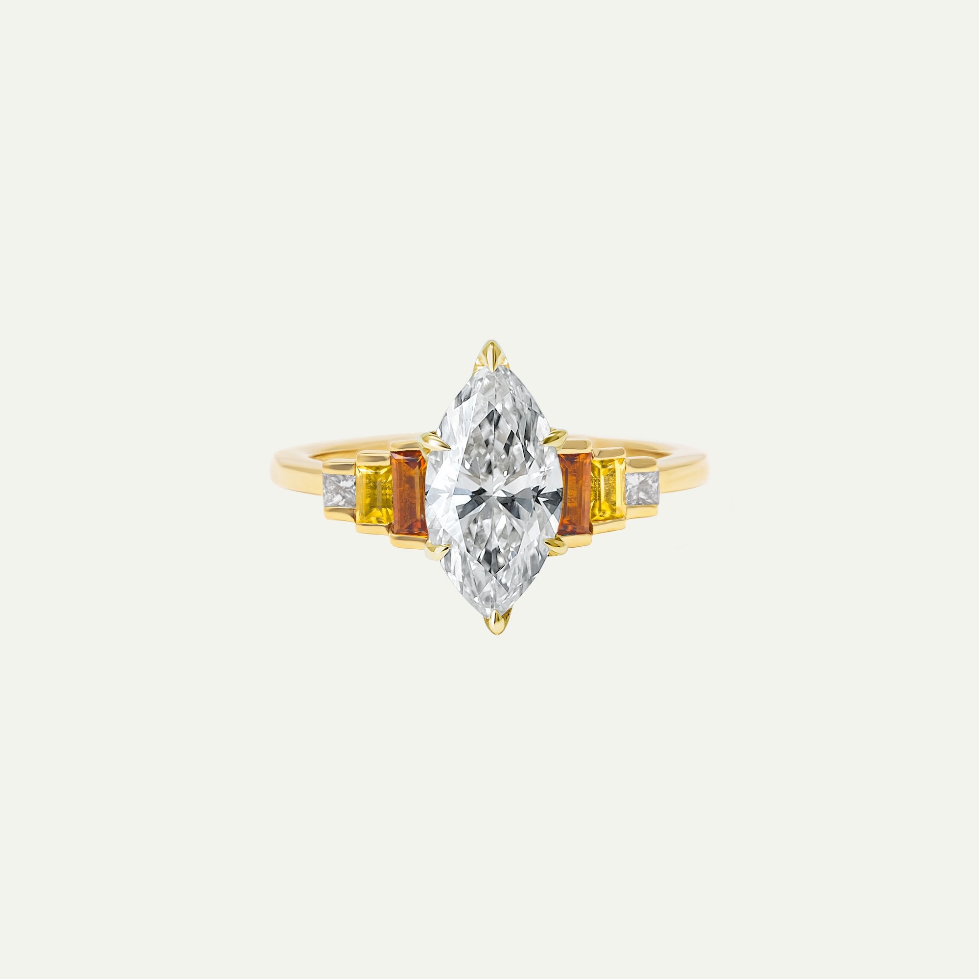 Aureon art-deco engagement ring in 18ct yellow gold with marquise-cut white diamond and baguette citrine and yellow sapphire and princess-cut white diamonds side stones in 3-step design from EDXU bespoke jeweller London on a plain background