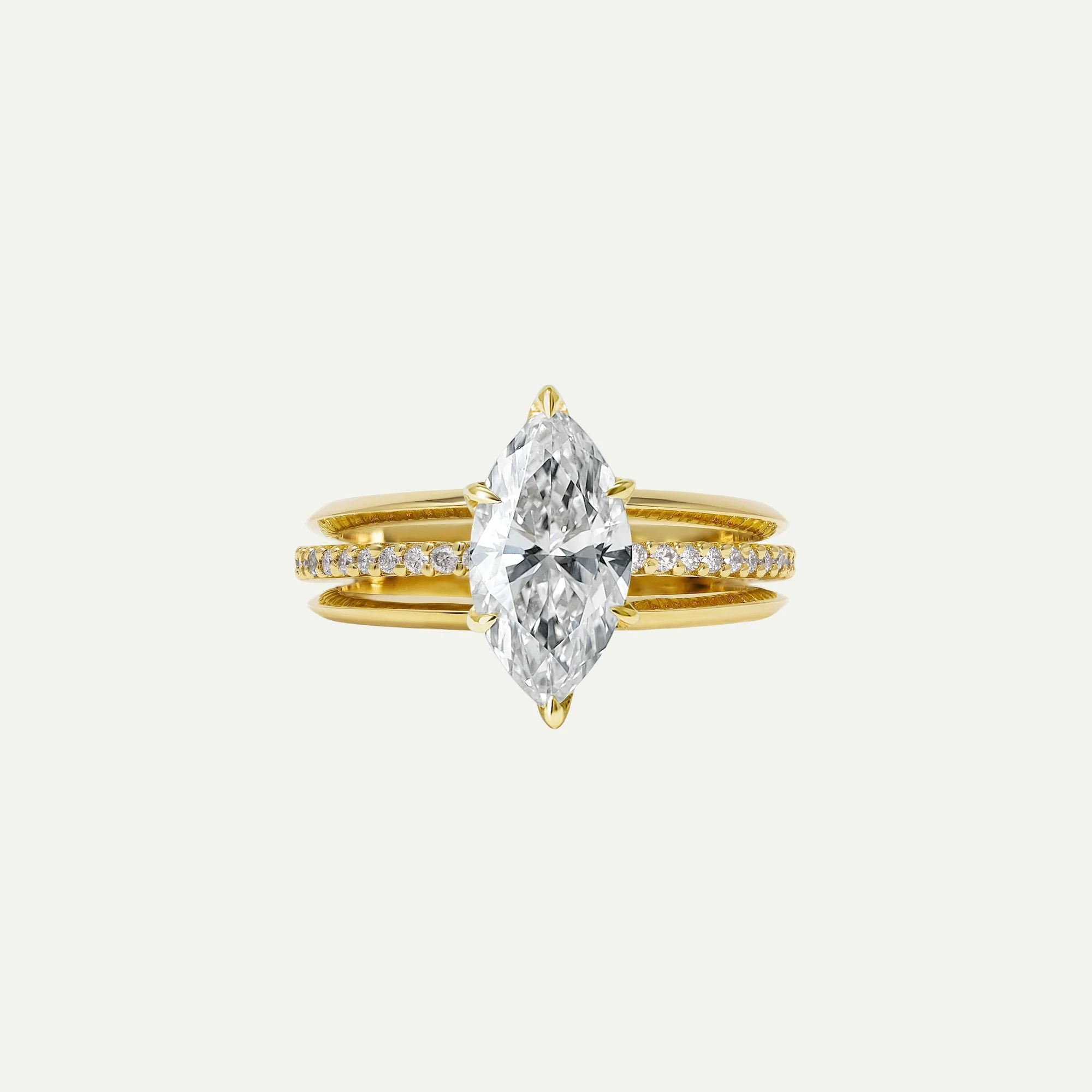 Maeve modern alternative engagement ring features a centre marquise-cut diamond with architectural 3-band design with small diamond pave from EDXU bespoke jeweller London