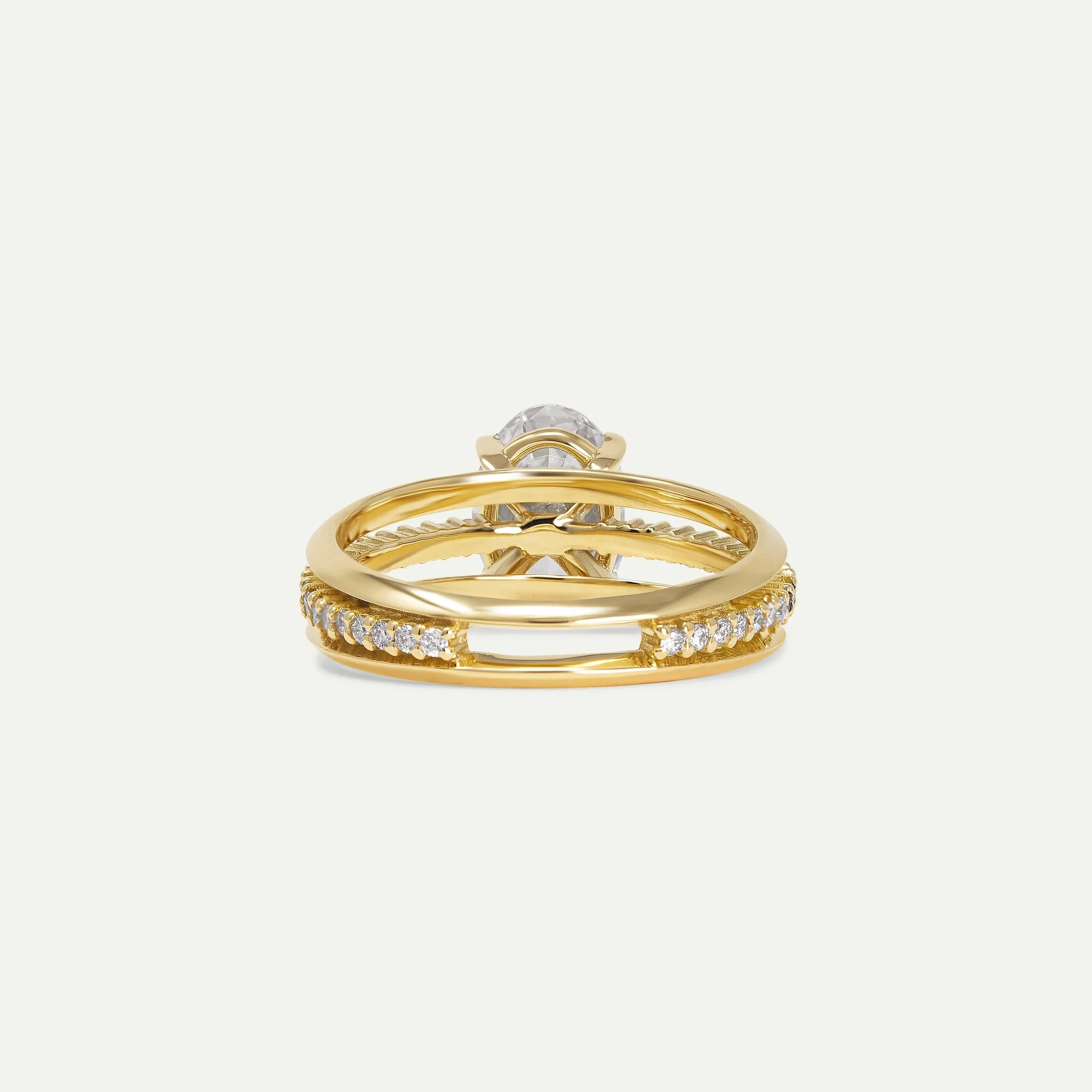 Maeve modern alternative engagement ring features a centre oval-cut diamond with architectural 3-band design with small diamond pave from EDXU bespoke jeweller London back view