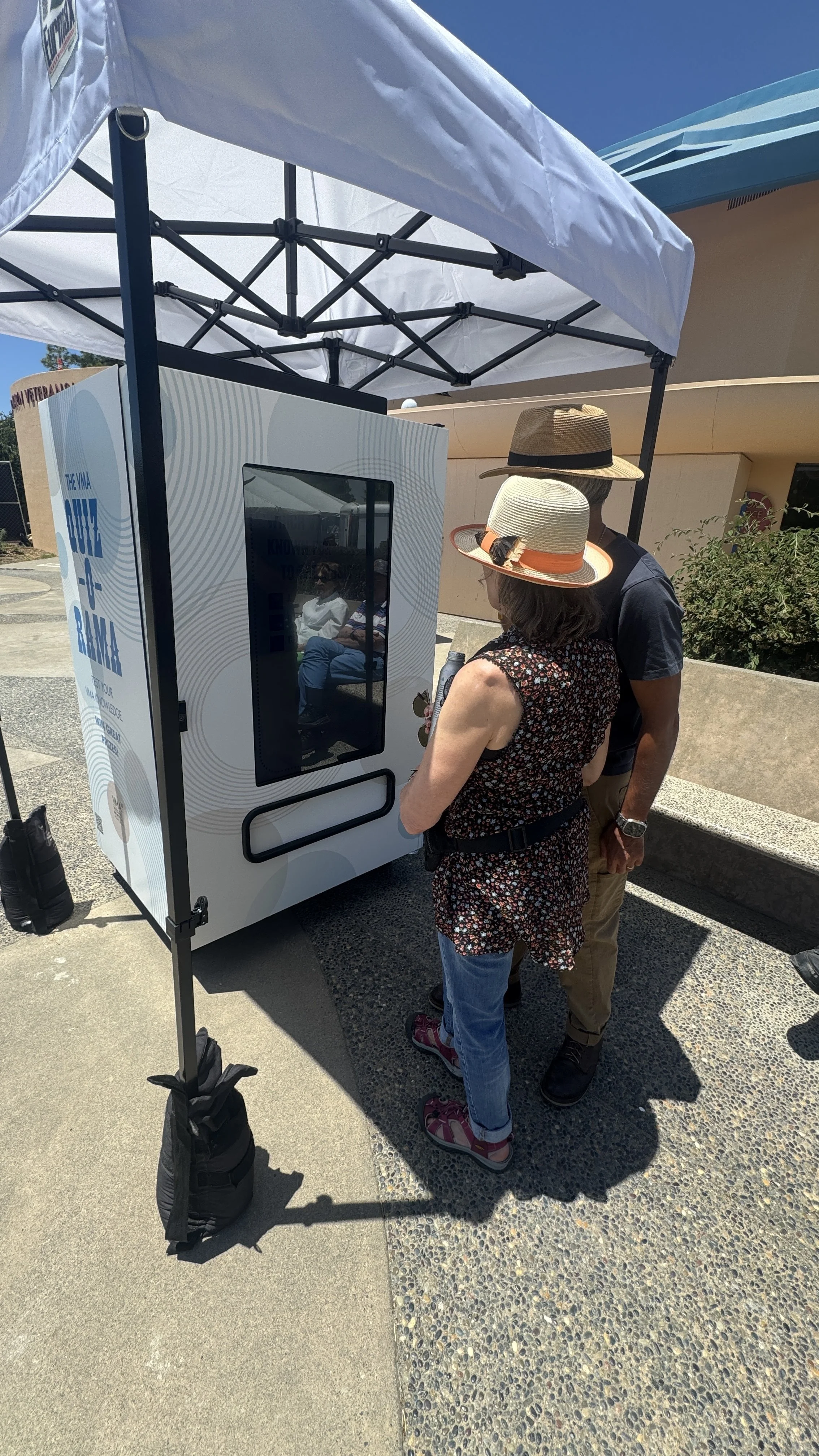 People using a social media vending machine