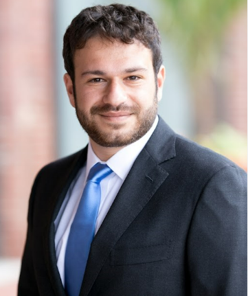 Episode 99: Andrew Garin on the Long-Run Effects of Public Investment