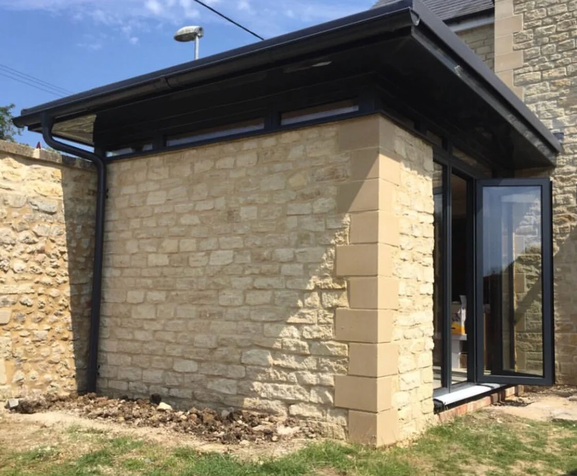 Stone rear extension in Swindon