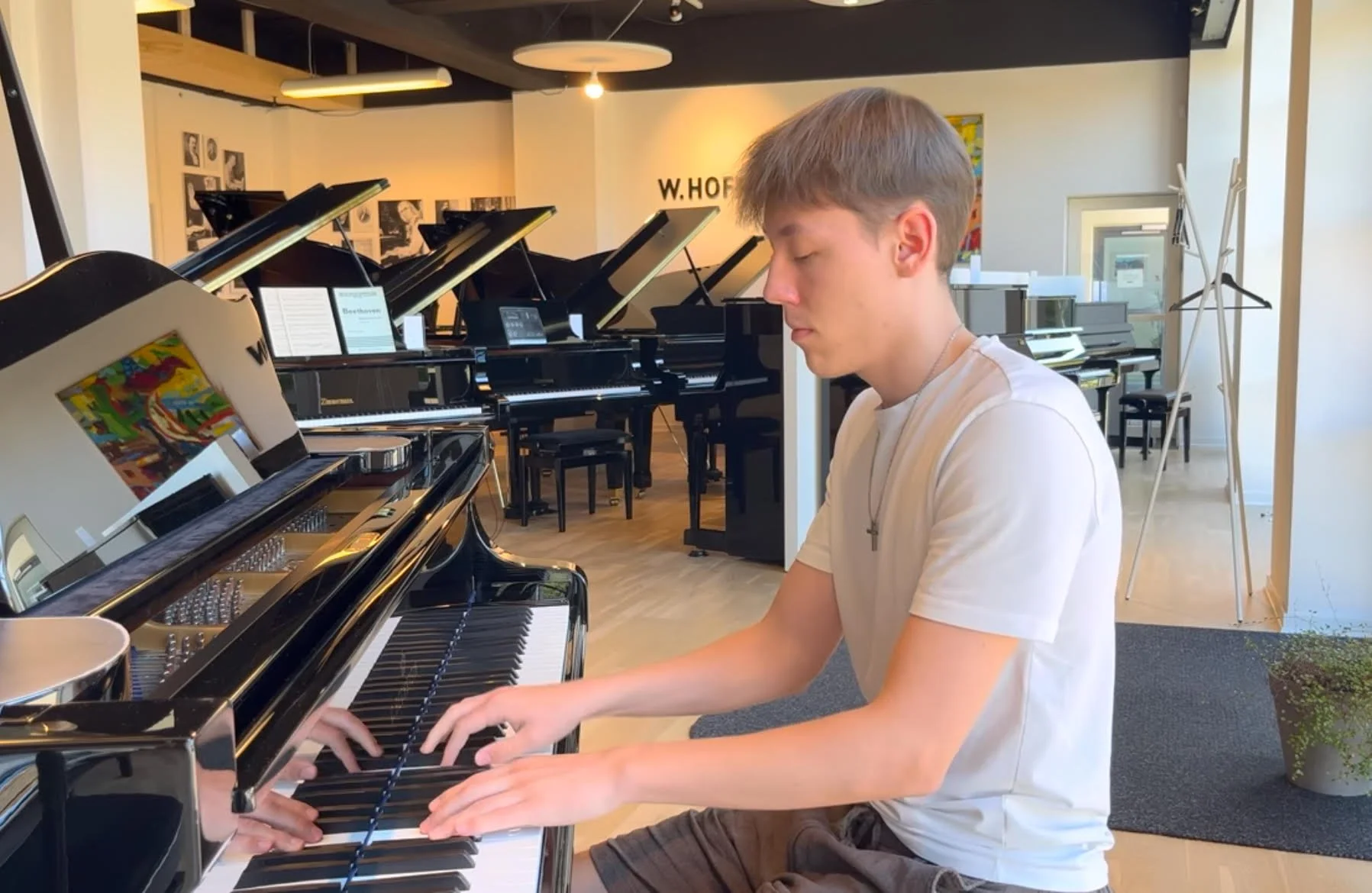 Pianist teaches others to play the keys