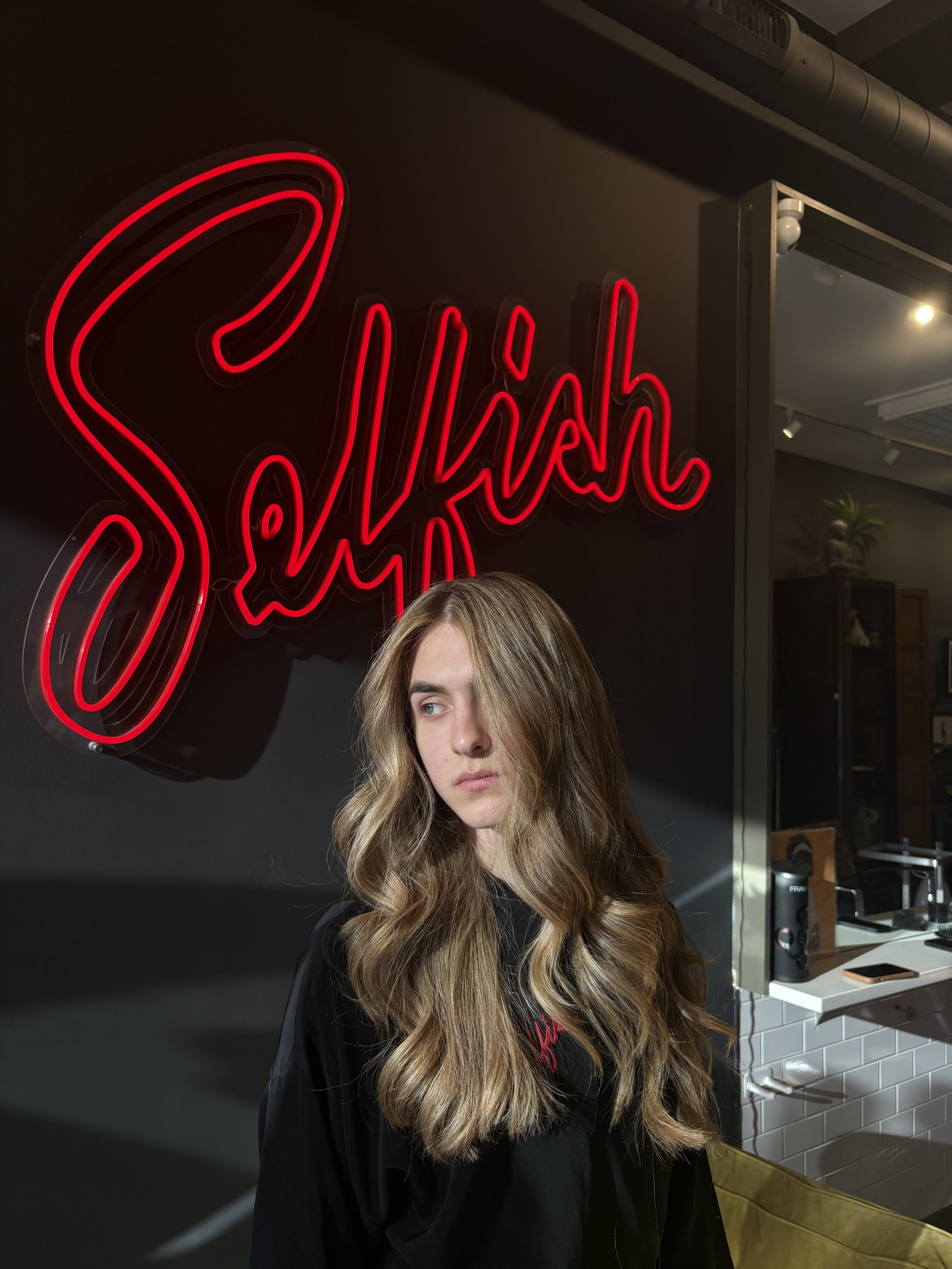 Stylist teaches hair care